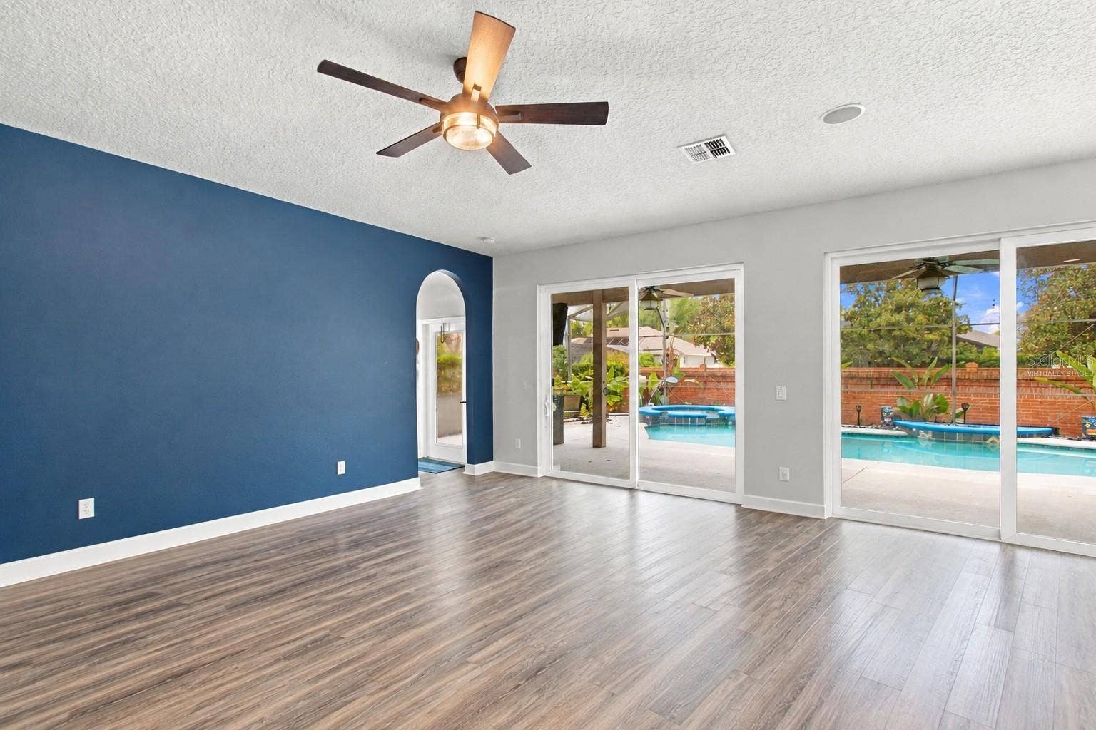 14031 ZEPHERMOOR LANE, Winter Garden, FL 34787 Family room virtually staged