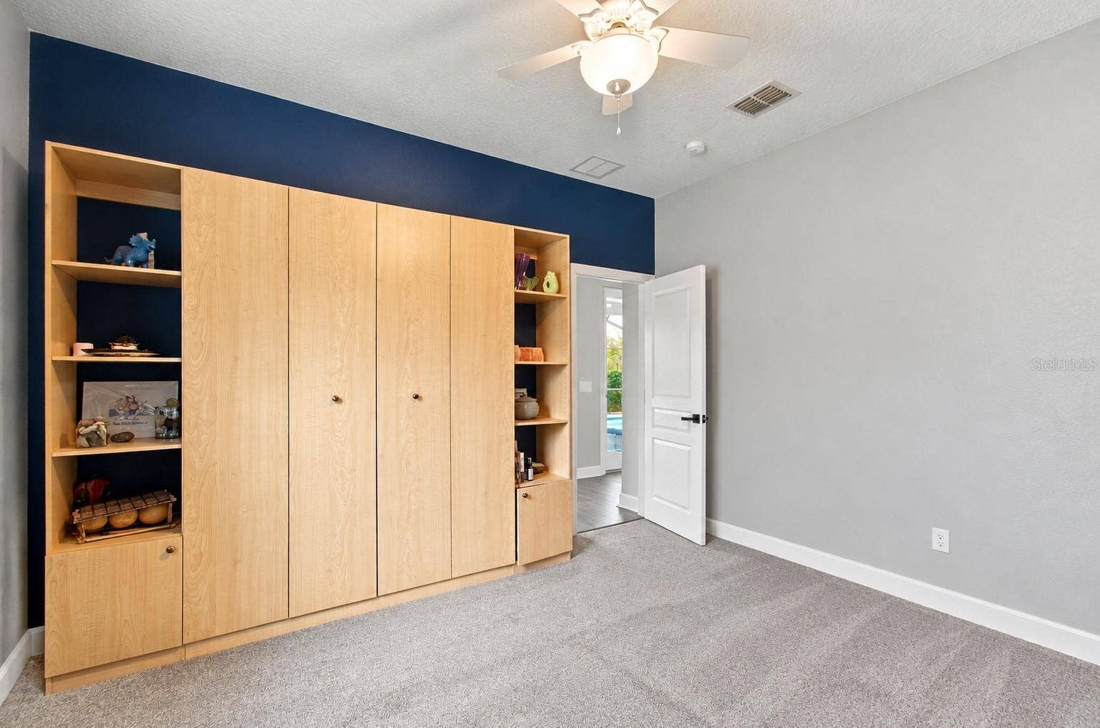 14031 ZEPHERMOOR LANE, Winter Garden, FL 34787 Furniture virtually Bedroom 5 downstairs Murphy bed is built in