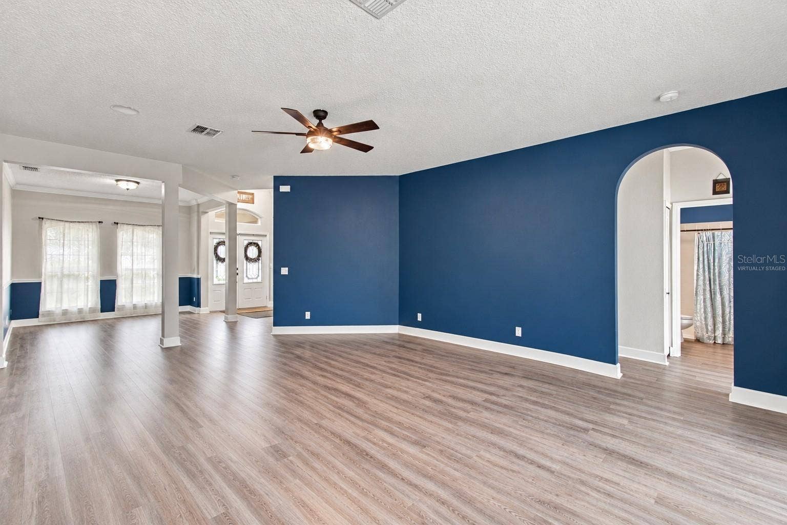 14031 ZEPHERMOOR LANE, Winter Garden, FL 34787 family room virtually staged