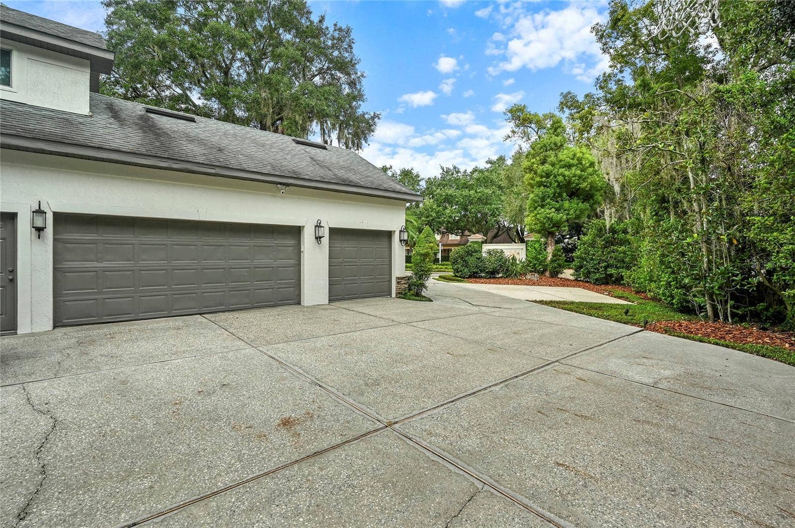 Spacious Driveway Area with 3 Car Garage