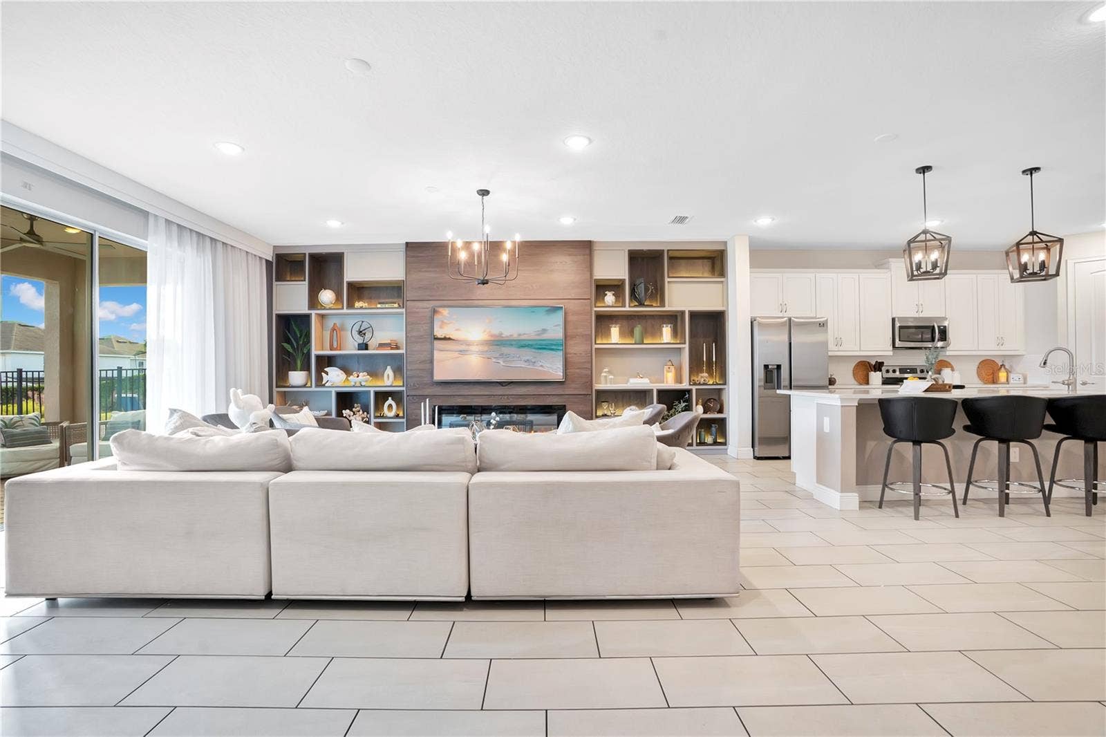 7704 WESTLAND DRIVE, Kissimmee, FL 34747 The heart of the home - generous gathering spaces designed for connection