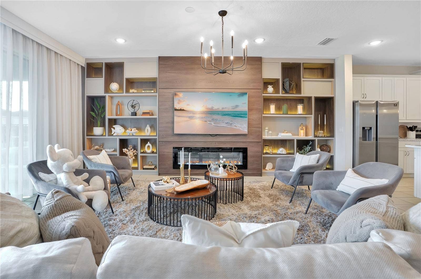 7704 WESTLAND DRIVE, Kissimmee, FL 34747 Beautifully appointed living spaces blend refined design with effortless comfort, creating an inviting setting for entertaining and relaxation