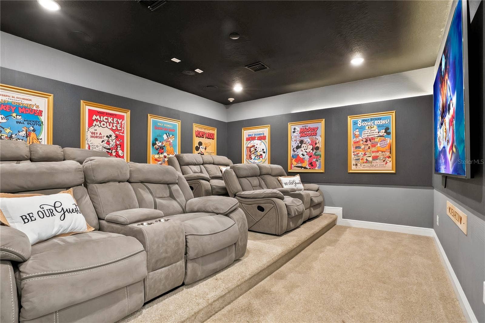 7704 WESTLAND DRIVE, Kissimmee, FL 34747 The Wonderful World of Disney Theater - plush reclining seating, custom architectural details, and immersive lighting