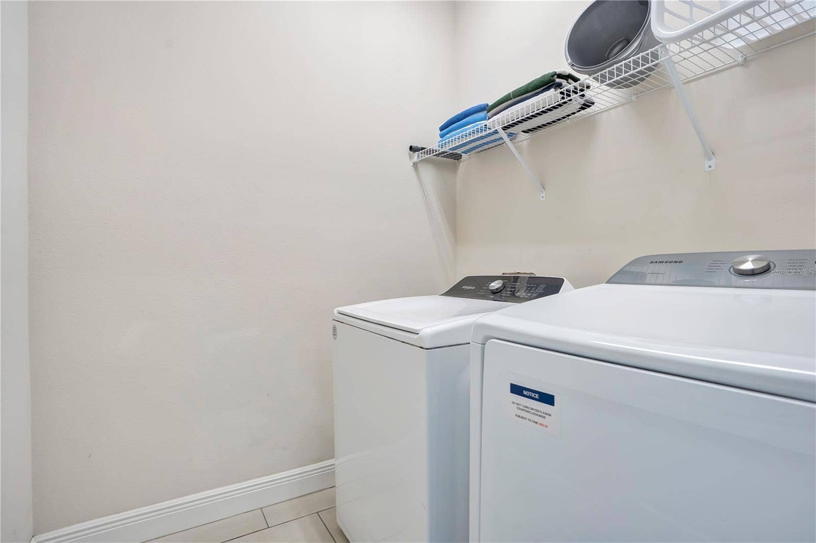 7704 WESTLAND DRIVE, Kissimmee, FL 34747 Two dedicated laundry rooms offer added convenience for extended stays and large groups