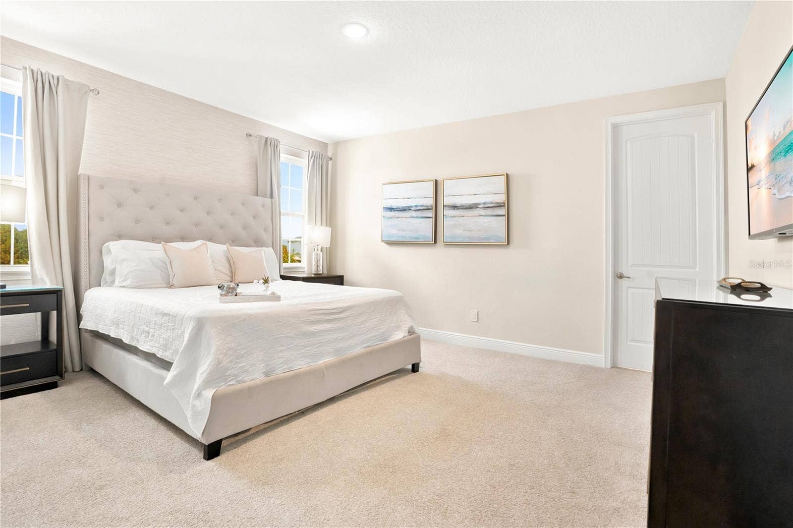 7704 WESTLAND DRIVE, Kissimmee, FL 34747 A peaceful second upstairs suite with elegant furnishings and a soft, neutral palette