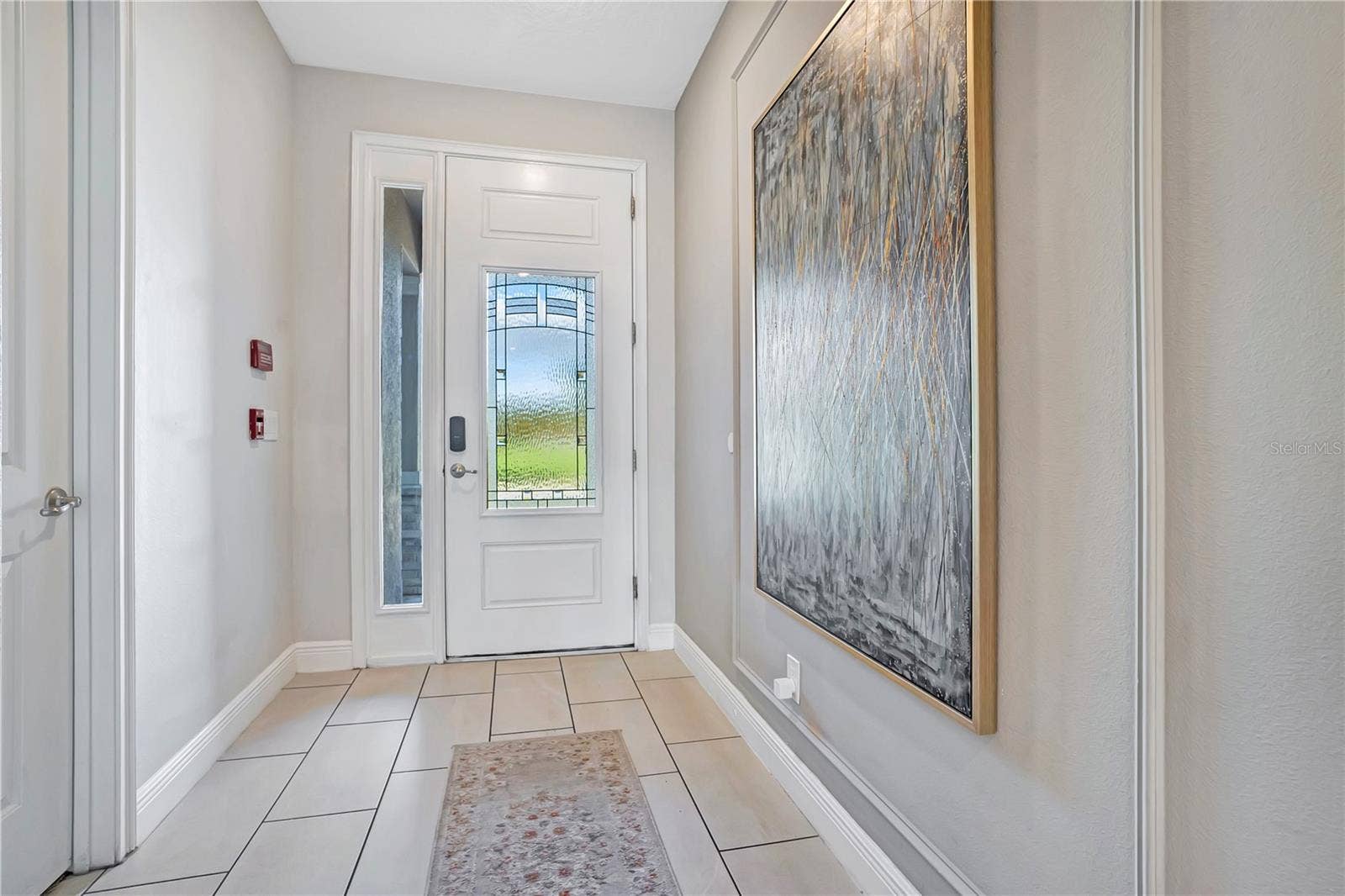 7704 WESTLAND DRIVE, Kissimmee, FL 34747 A welcoming entry sets the tone with elegant finishes, and a bright, sophisticated introduction to the home