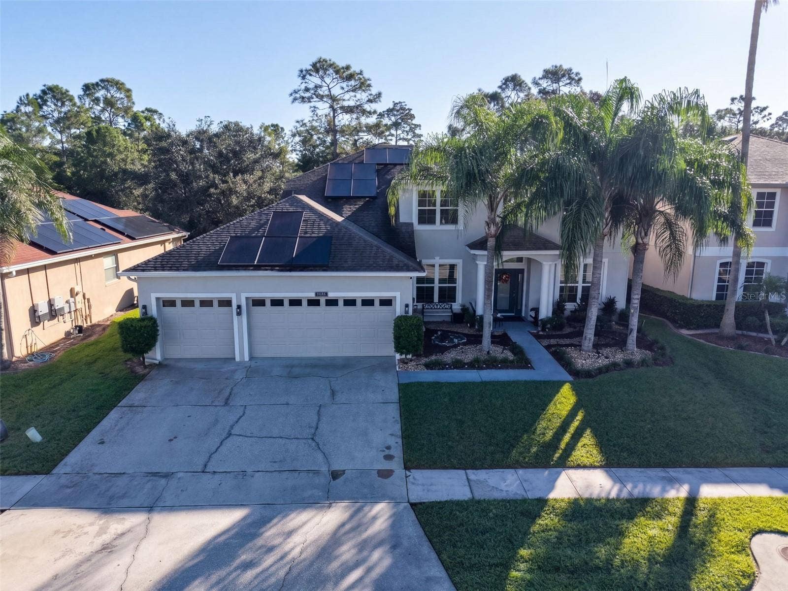 10603 SUNRISE TERRACE DRIVE, Orlando, FL 32825 Front Elevation showing solar panels