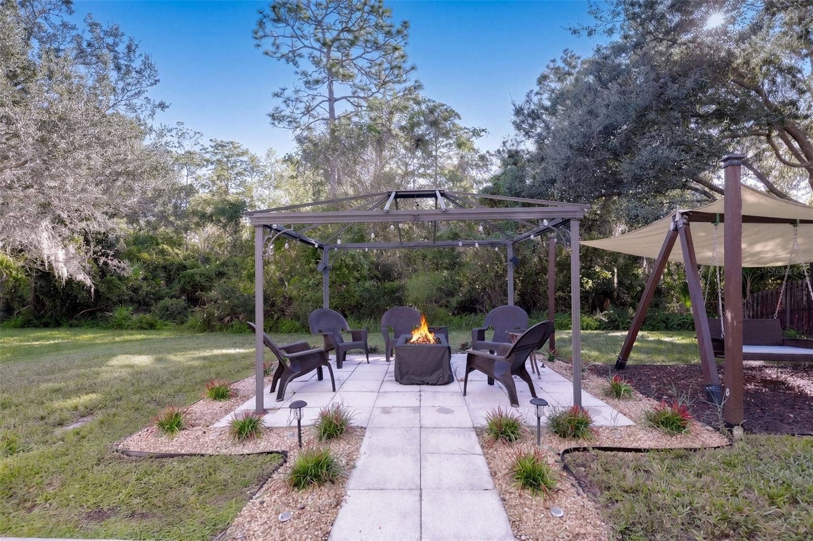 10603 SUNRISE TERRACE DRIVE, Orlando, FL 32825 Back yard with Patio Area