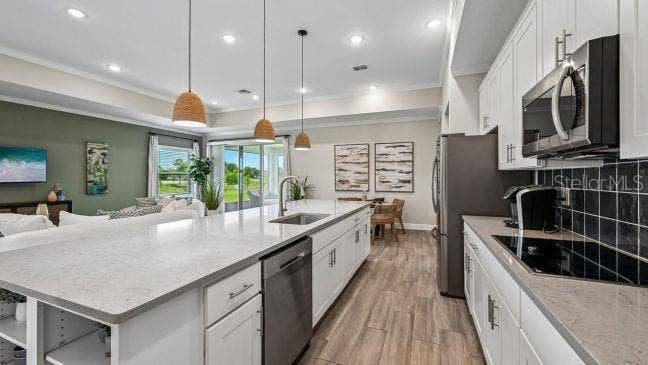 5011 LYDIA COURT, Spring Hill, FL 34608 Model home - actual features may vary.