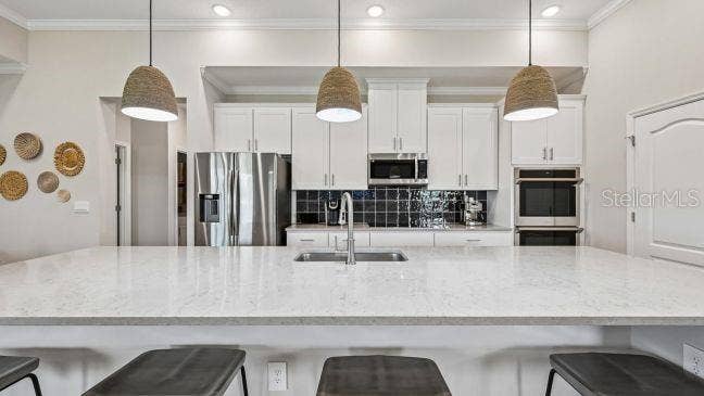 5011 LYDIA COURT, Spring Hill, FL 34608 Model home - actual features may vary.