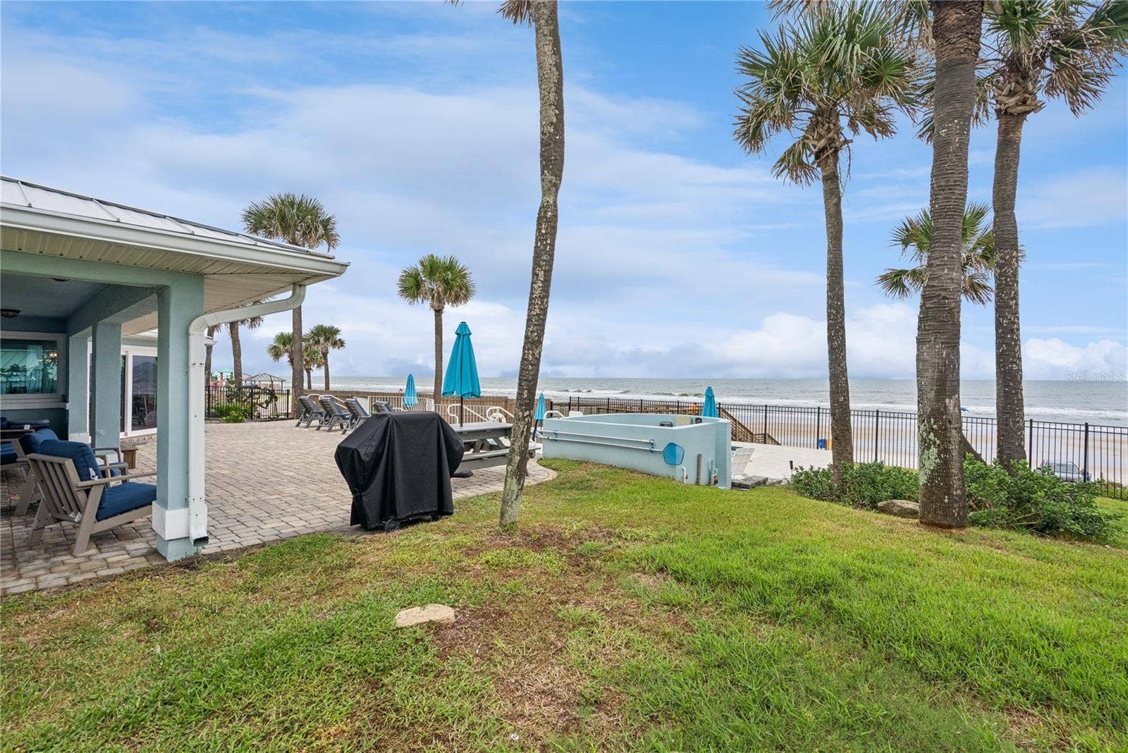 Fully fenced ocean front lot with pool and lots of room to play!