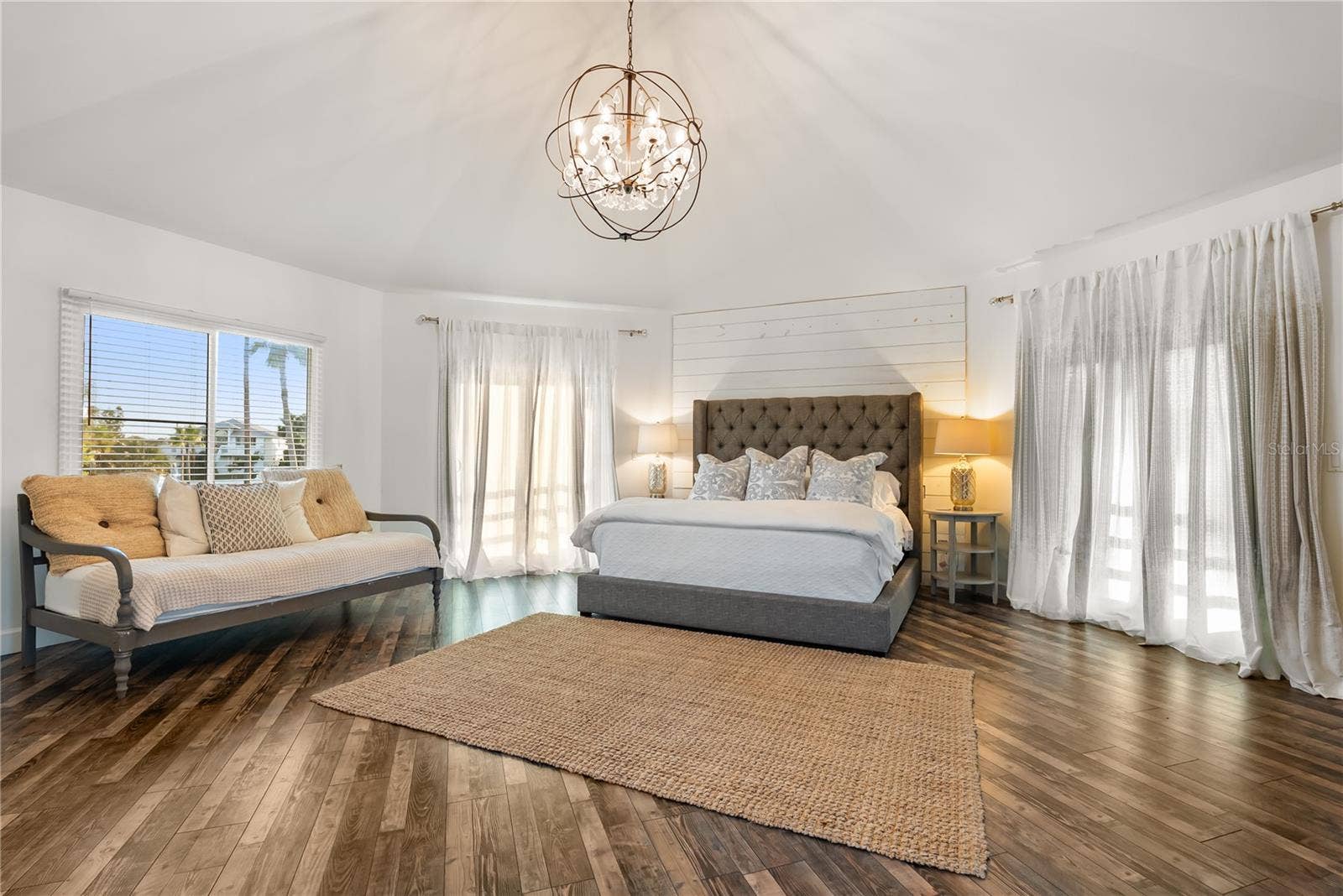 Primary suite: Spacious coastal retreat with ocean views, two large walk-in closets, and access to an oversized composite terrace overlooking the Atlantic