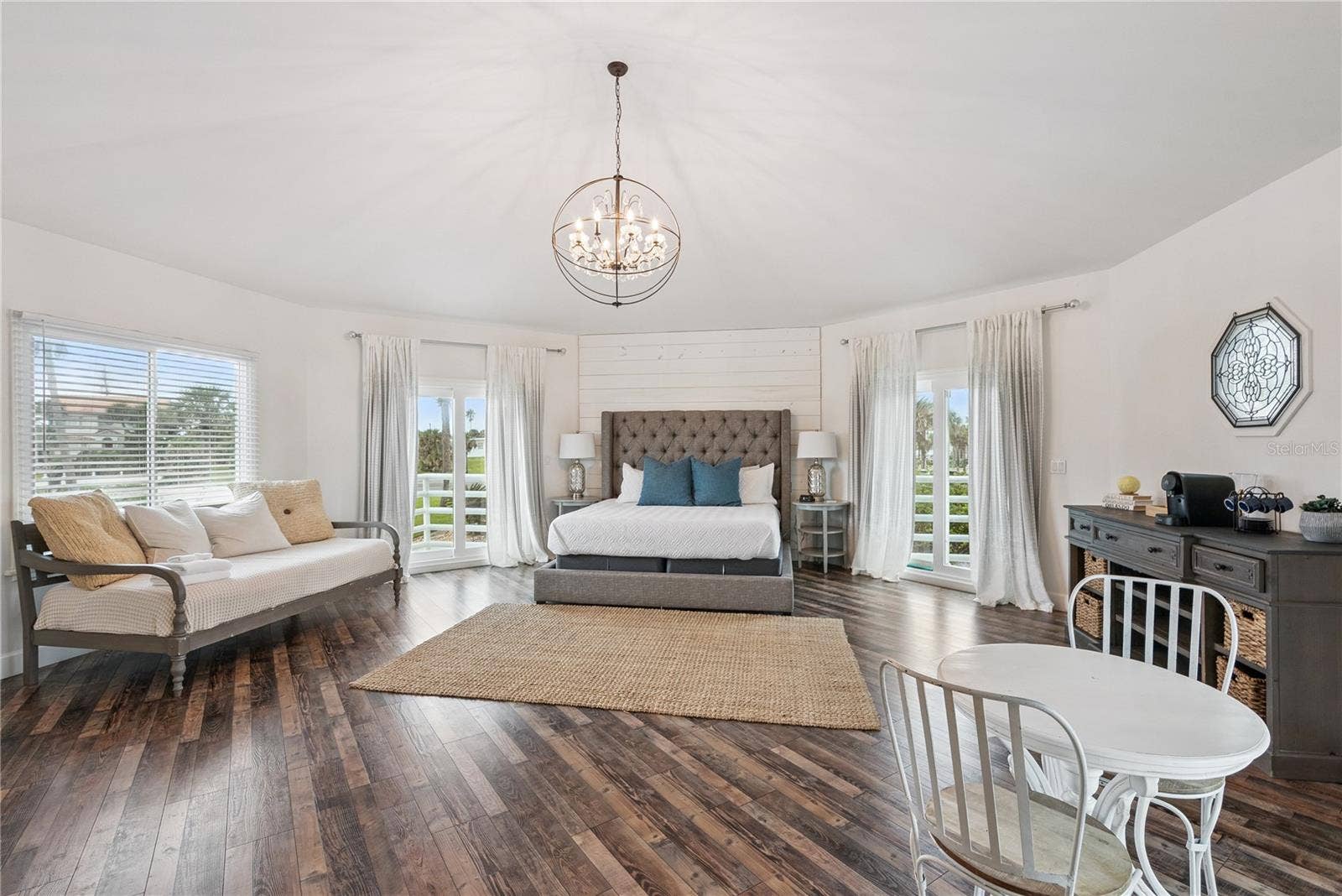Primary suite: Spacious coastal retreat with ocean views, two large walk-in closets, and access to an oversized composite terrace overlooking the Atlantic