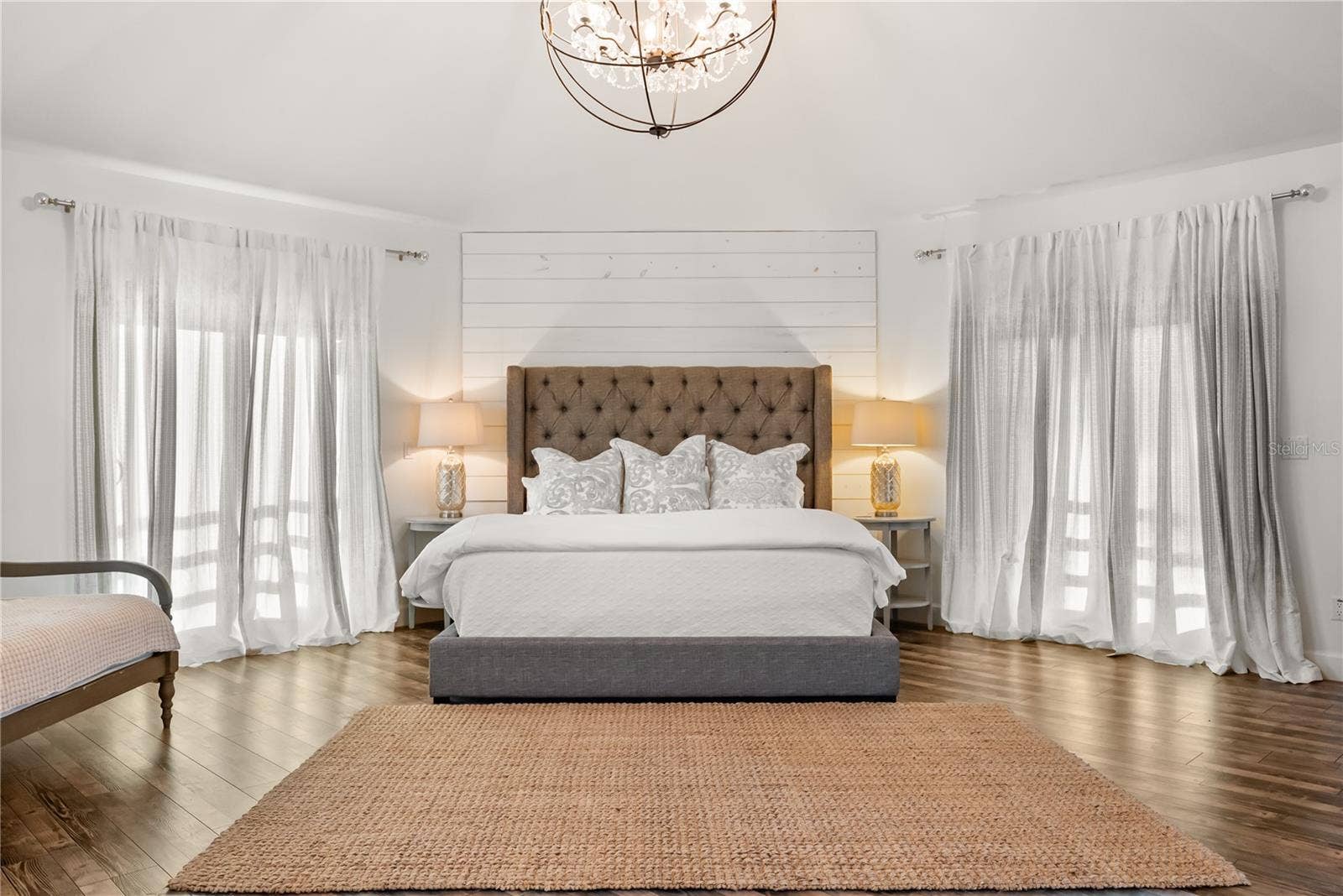 Primary suite: Spacious coastal retreat with ocean views, two large walk-in closets, and access to an oversized composite terrace overlooking the Atlantic