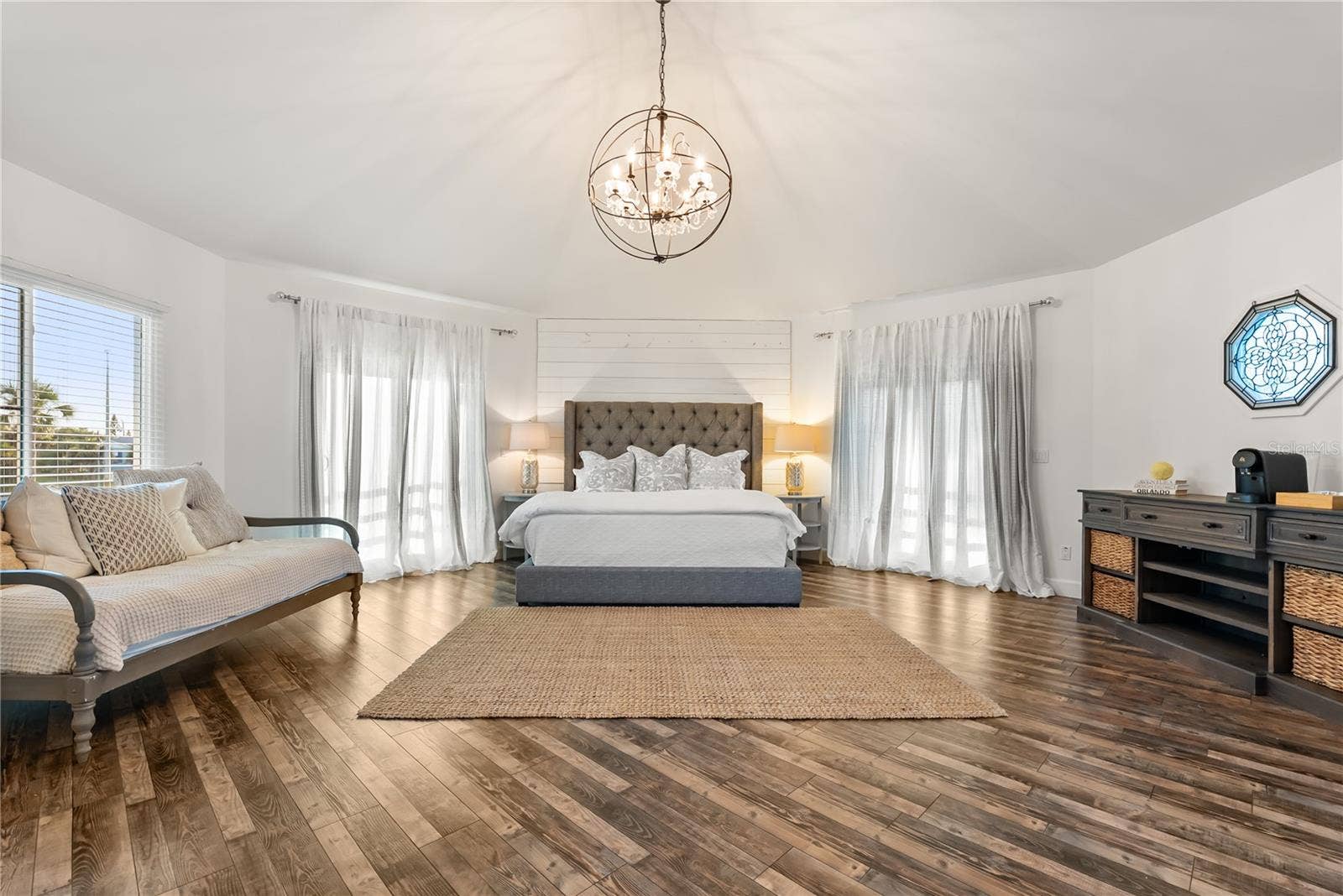 Primary suite: Spacious coastal retreat with ocean views, two large walk-in closets, and access to an oversized composite terrace overlooking the Atlantic