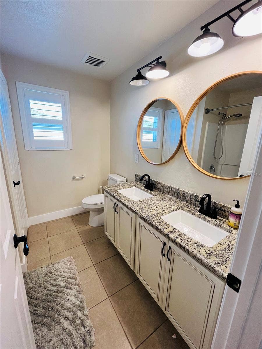 14037 PECAN ORCHARD DRIVE, Winter Garden, FL 34787 Hallway Bathroom next to Bedrooms 2 and 3