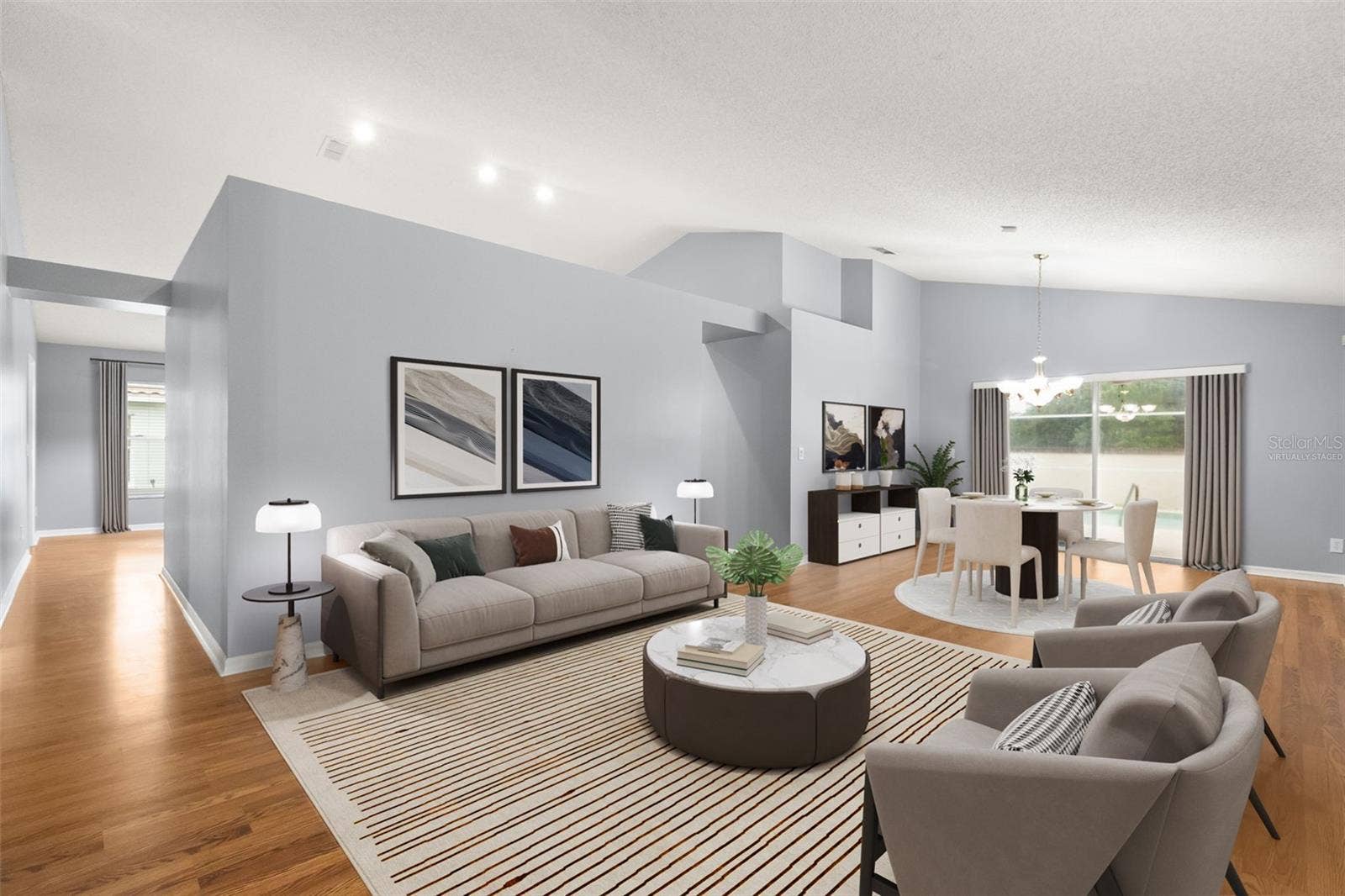 Virtually staged living and dining room and view from your front entry