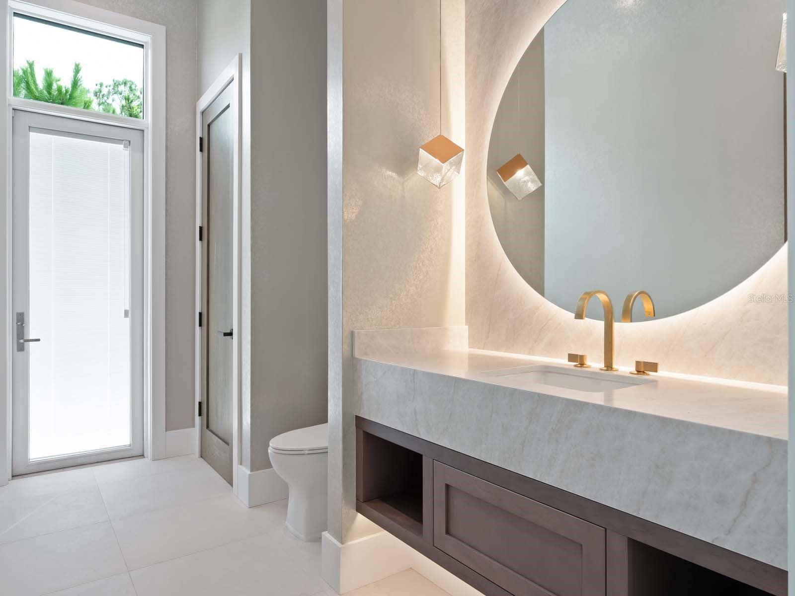 Downstairs Half Bath with Pool Access