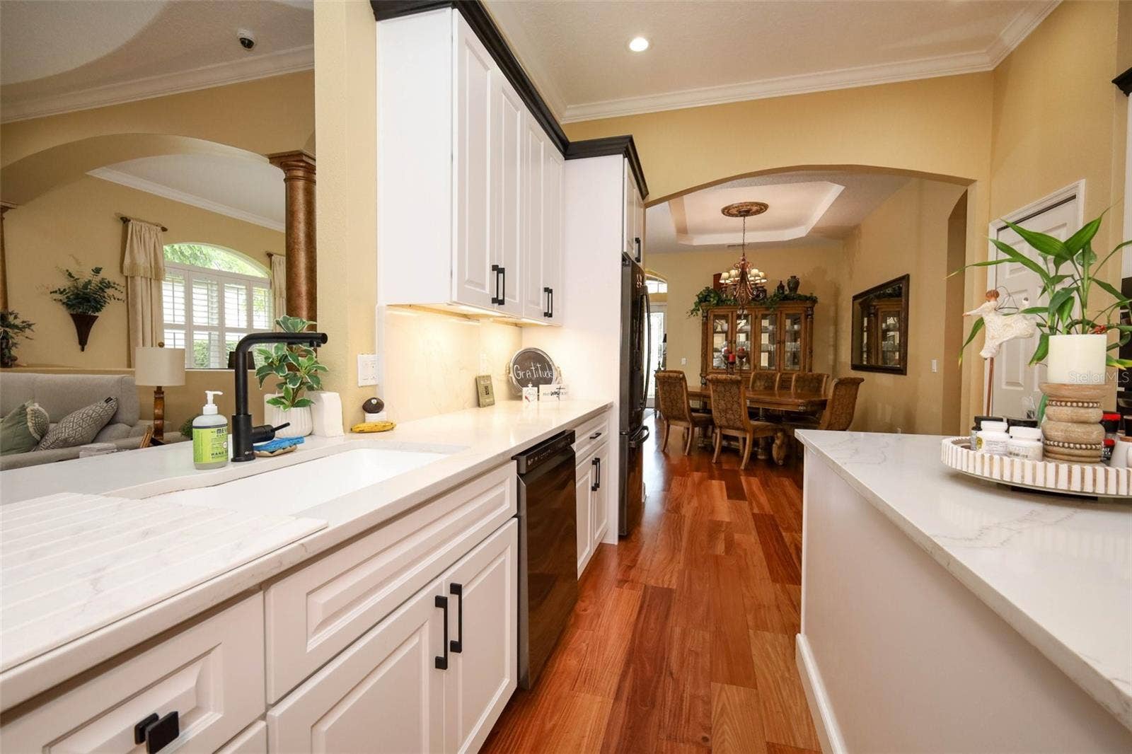 Updated kitchen with quartz counters, 48" cabinets and newer appliances