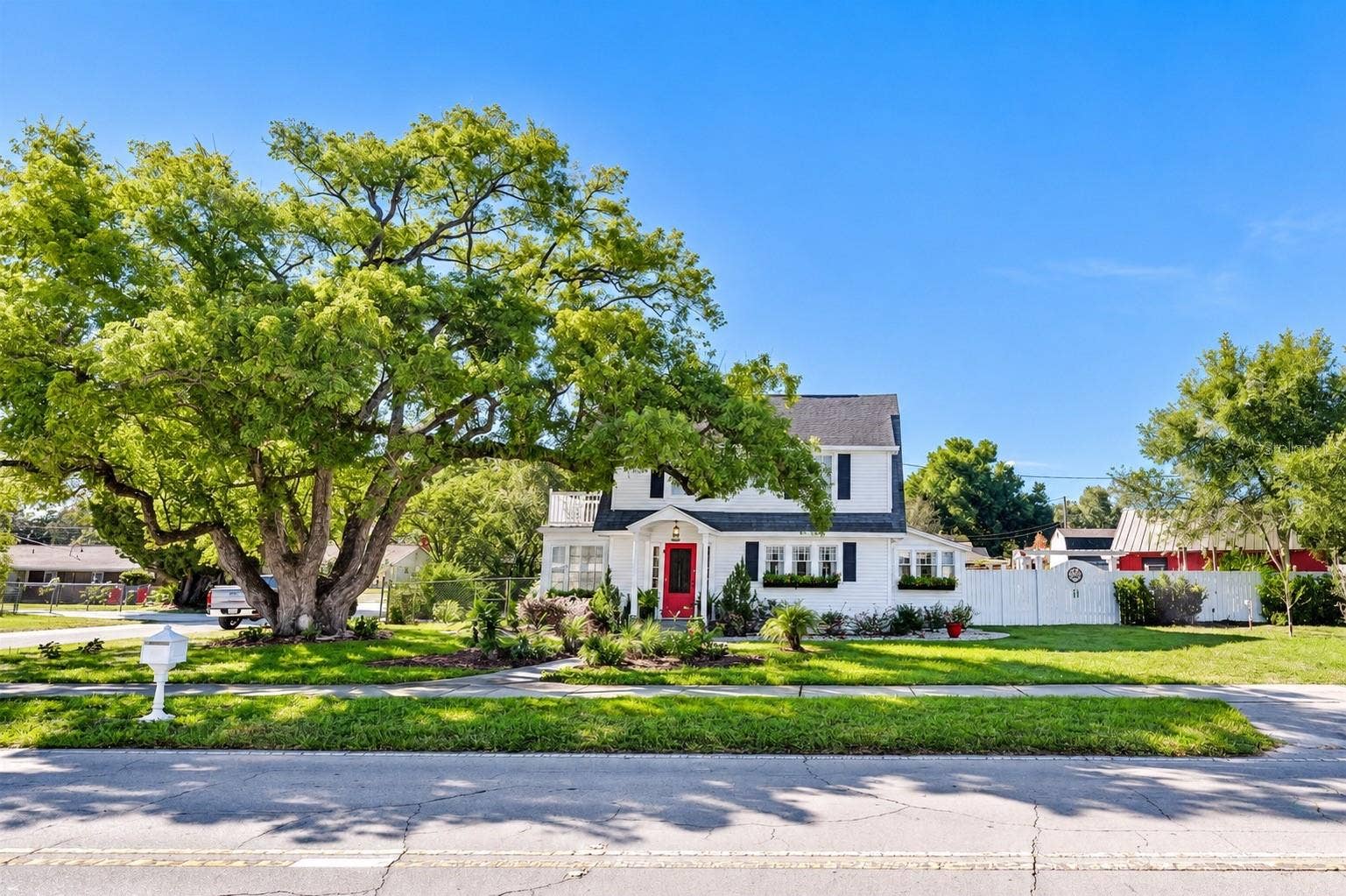1901 10TH STREET, St Cloud, FL 34769 Charming farmhouse situated on an expansive .34-ACRE CORNER LOT, featuring a spacious FENCED BACKYARD, a BARN WITH ELECTRICITY, and an incredible variety of EDIBLE FRUIT TREES, PLANTS, AND HERBS! Enjoy the beauty of mature trees, lush landscaping, and your very own backyard oasis, perfect for gardening, homesteading, and embracing a FARM-TO-TABLE LIFESTYLE right at home!