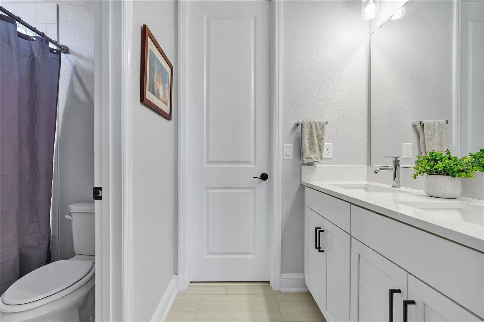 8336 CANETTI STREET, Orlando, FL 32827 Full bath with shower and tub combination and quartz vanity.