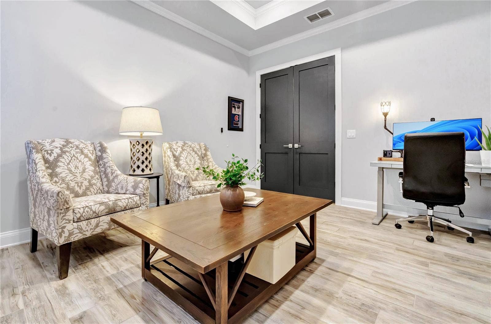 8336 CANETTI STREET, Orlando, FL 32827 Versatile flex room ideal as a home office, den, or additional guest space.
