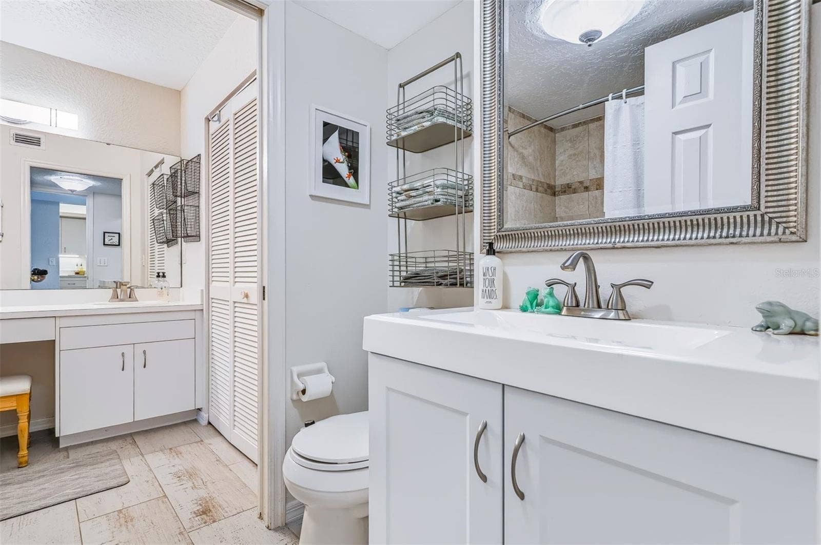 406 BOUCHELLE DRIVE, #103, New Smyrna Beach, FL 32169 another sink and Wc area