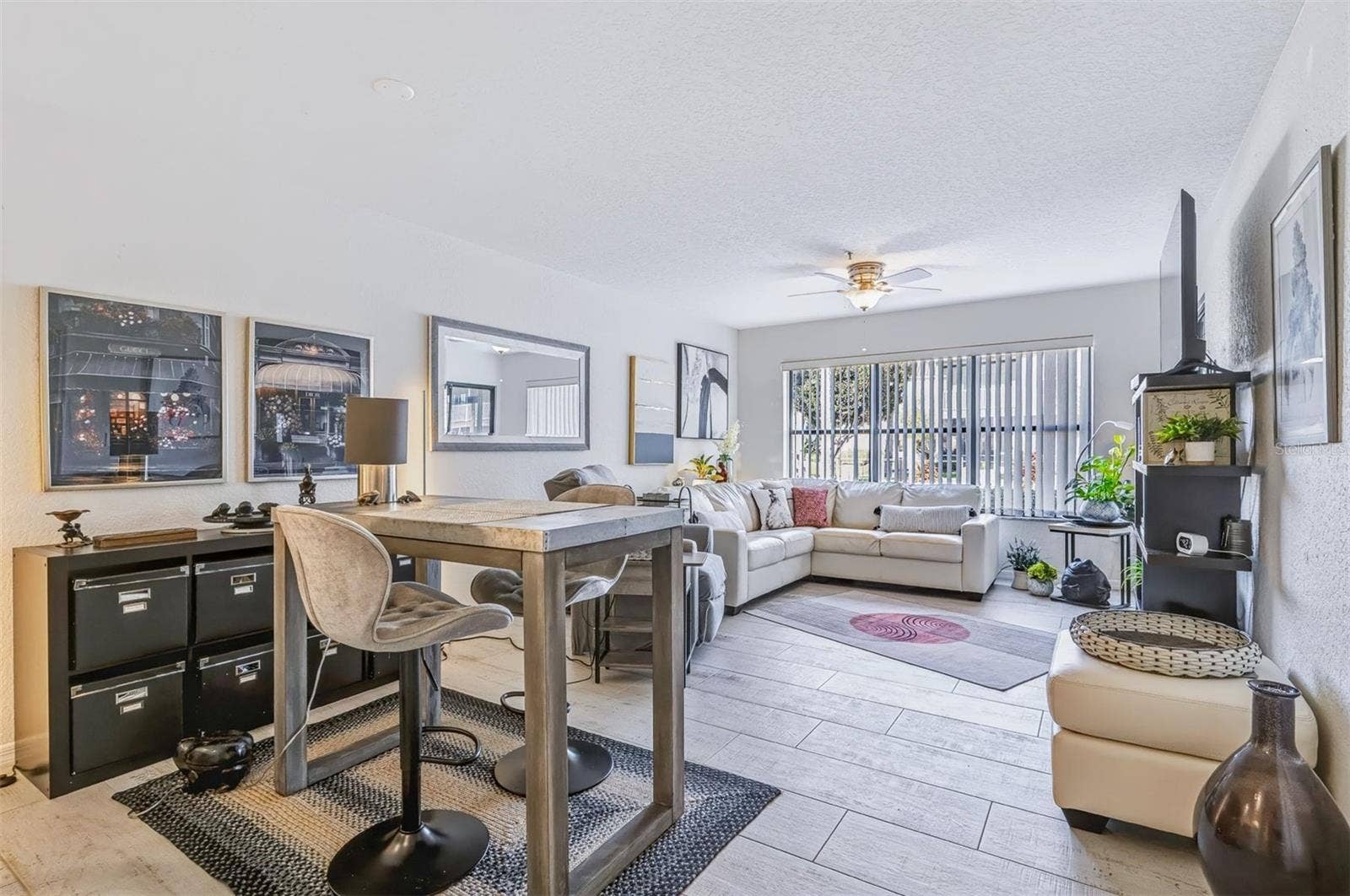 406 BOUCHELLE DRIVE, #103, New Smyrna Beach, FL 32169 Living and dining area