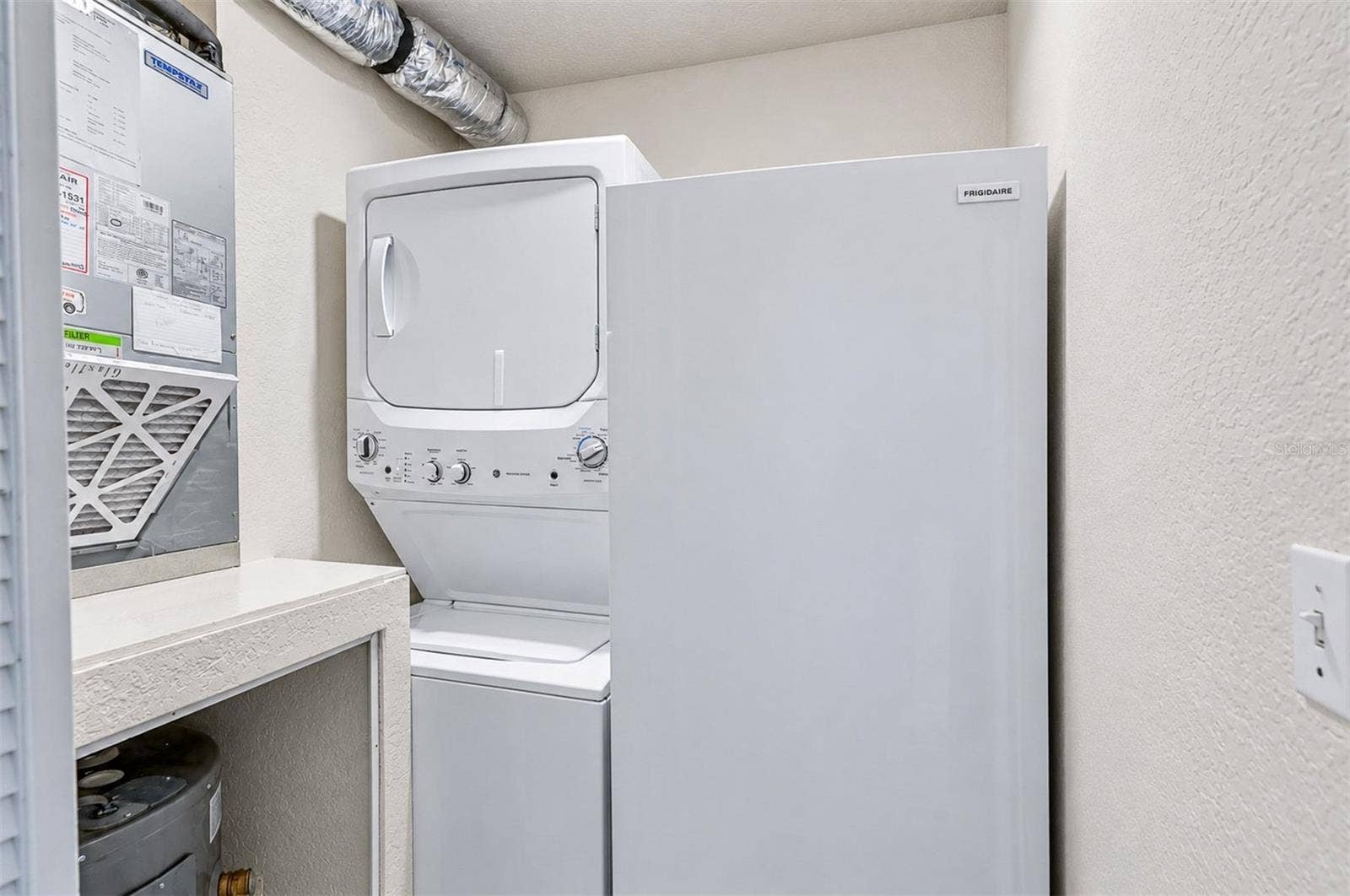 406 BOUCHELLE DRIVE, #103, New Smyrna Beach, FL 32169 Laundry room - freezer does not convey