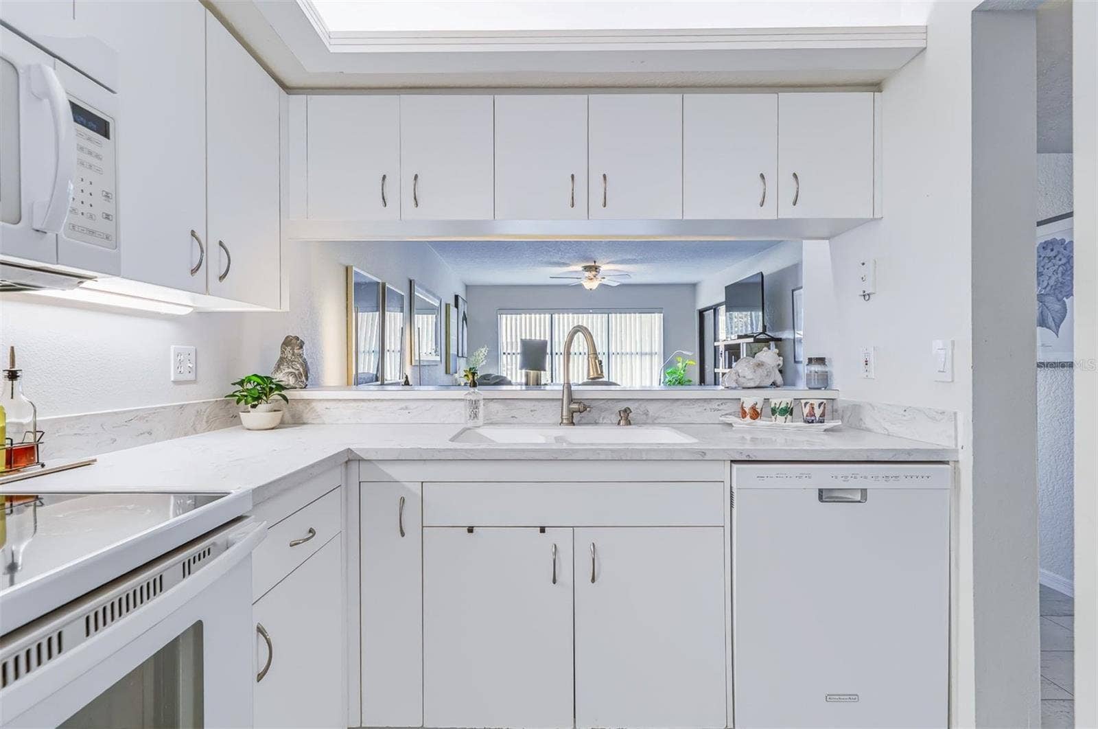406 BOUCHELLE DRIVE, #103, New Smyrna Beach, FL 32169 peekaboo to living area