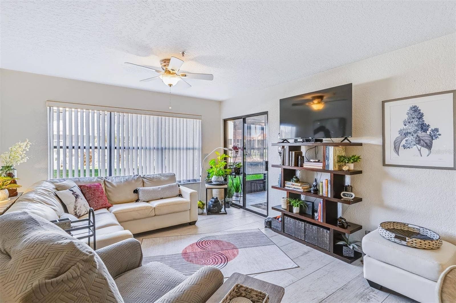406 BOUCHELLE DRIVE, #103, New Smyrna Beach, FL 32169 Living area with lots of natural light
