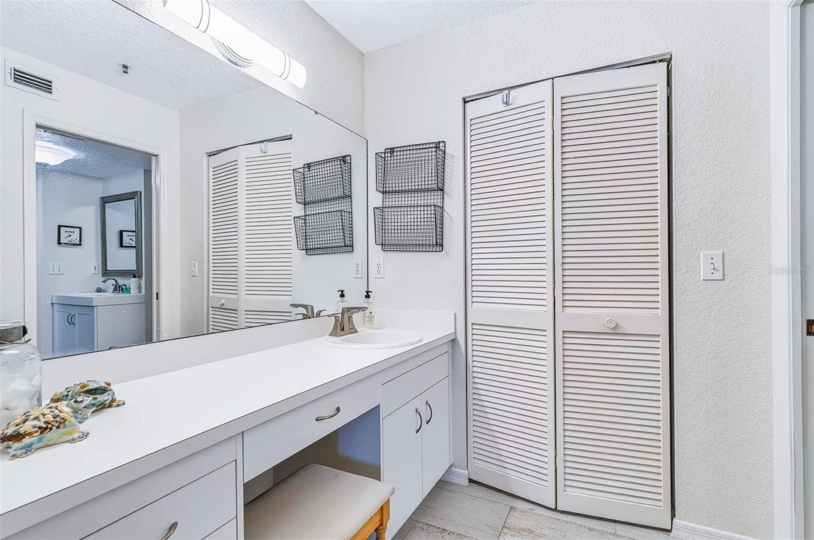 406 BOUCHELLE DRIVE, #103, New Smyrna Beach, FL 32169 vanity area off bedroom