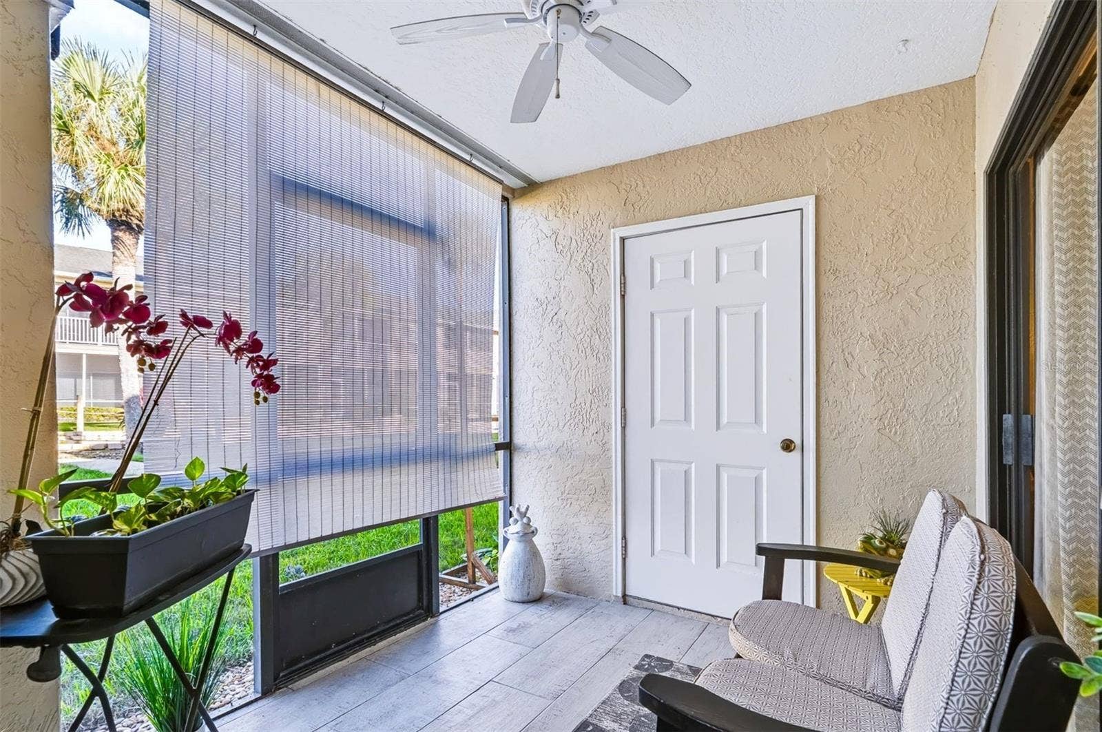 406 BOUCHELLE DRIVE, #103, New Smyrna Beach, FL 32169 screened in porch
