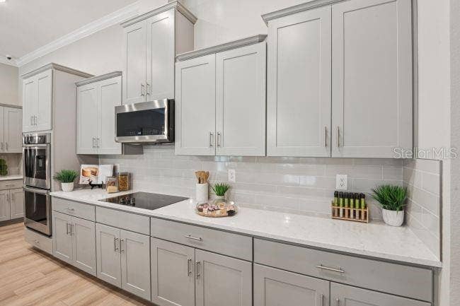 10 ELDER COURT W, Homosassa, FL 34446 Model home - actual features may vary.