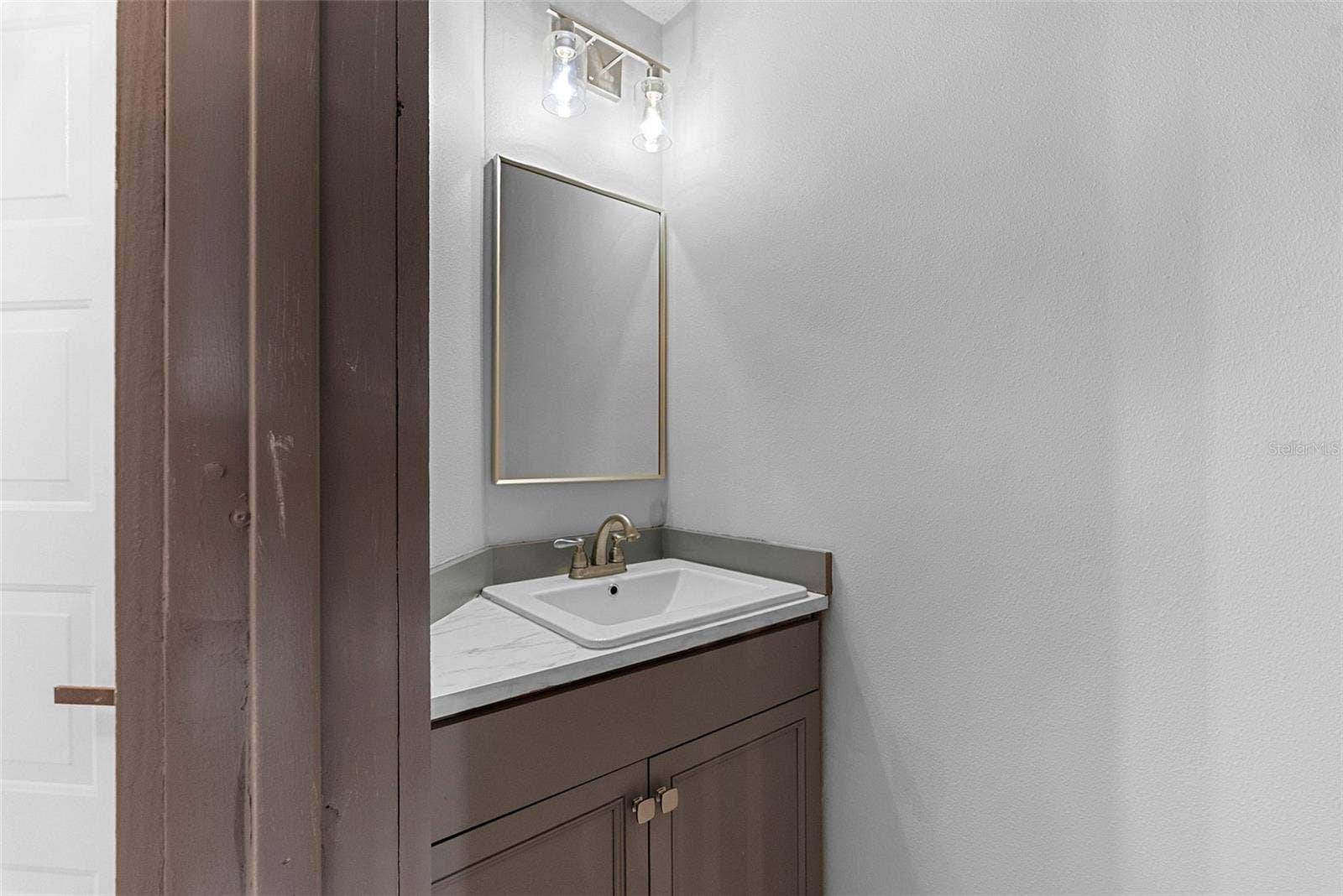 Half Bath Downstairs with Sink and Toilet