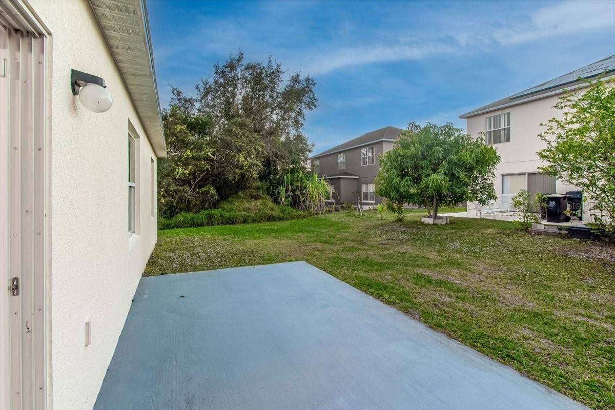 Large backyard with Concrete pad for your future workshop