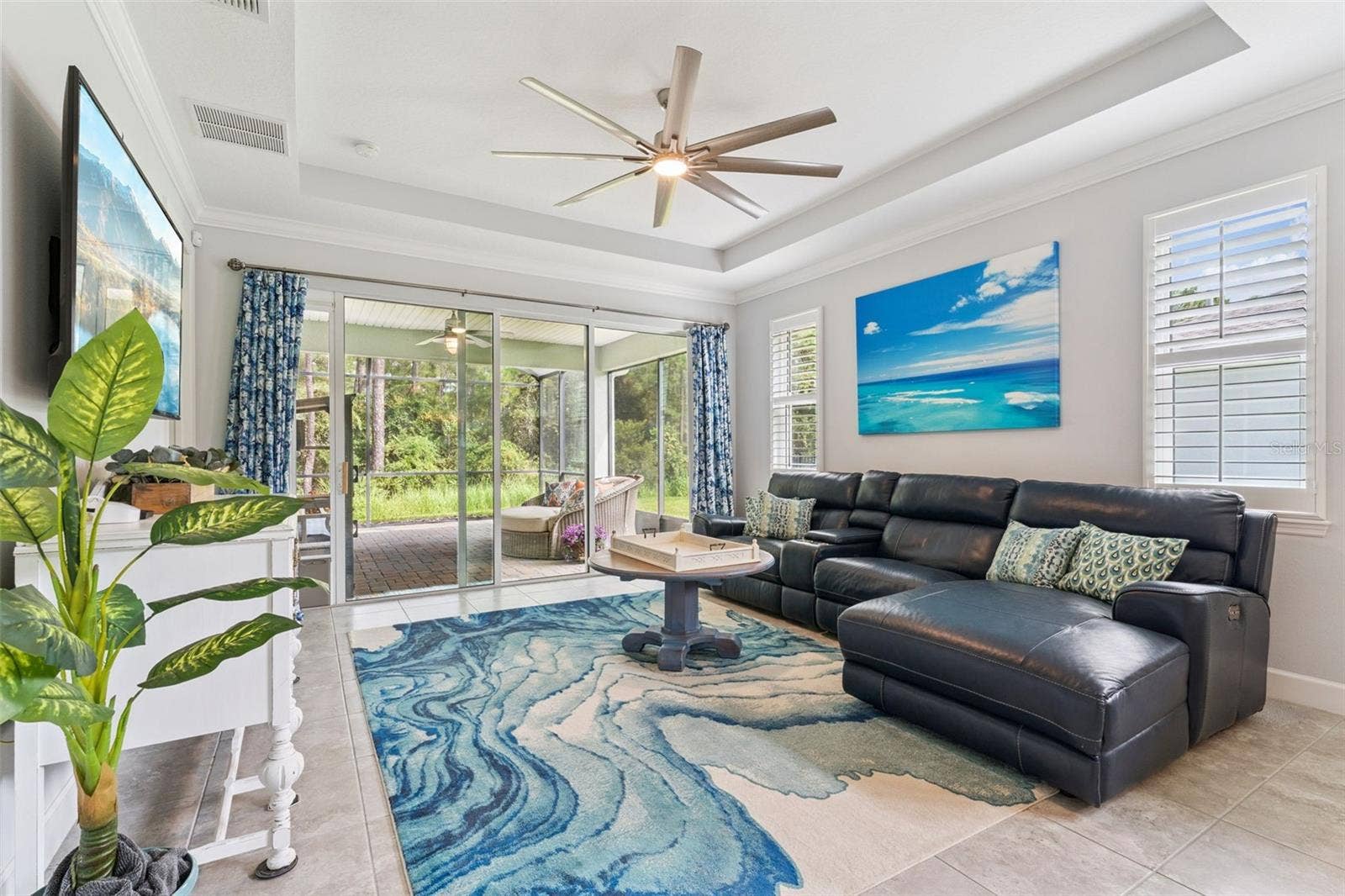1305 HAYTON AVE., Deland, FL 32724 15' x 15' Great Room w/ Plantation style shutters & a conservation area view