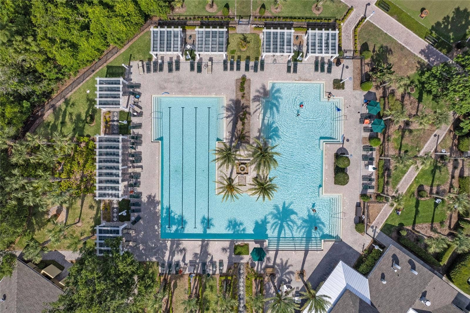 1305 HAYTON AVE., Deland, FL 32724 Aerial view of the Victoria Gardens resort style heated pool w/ shaded arbors around perimeter