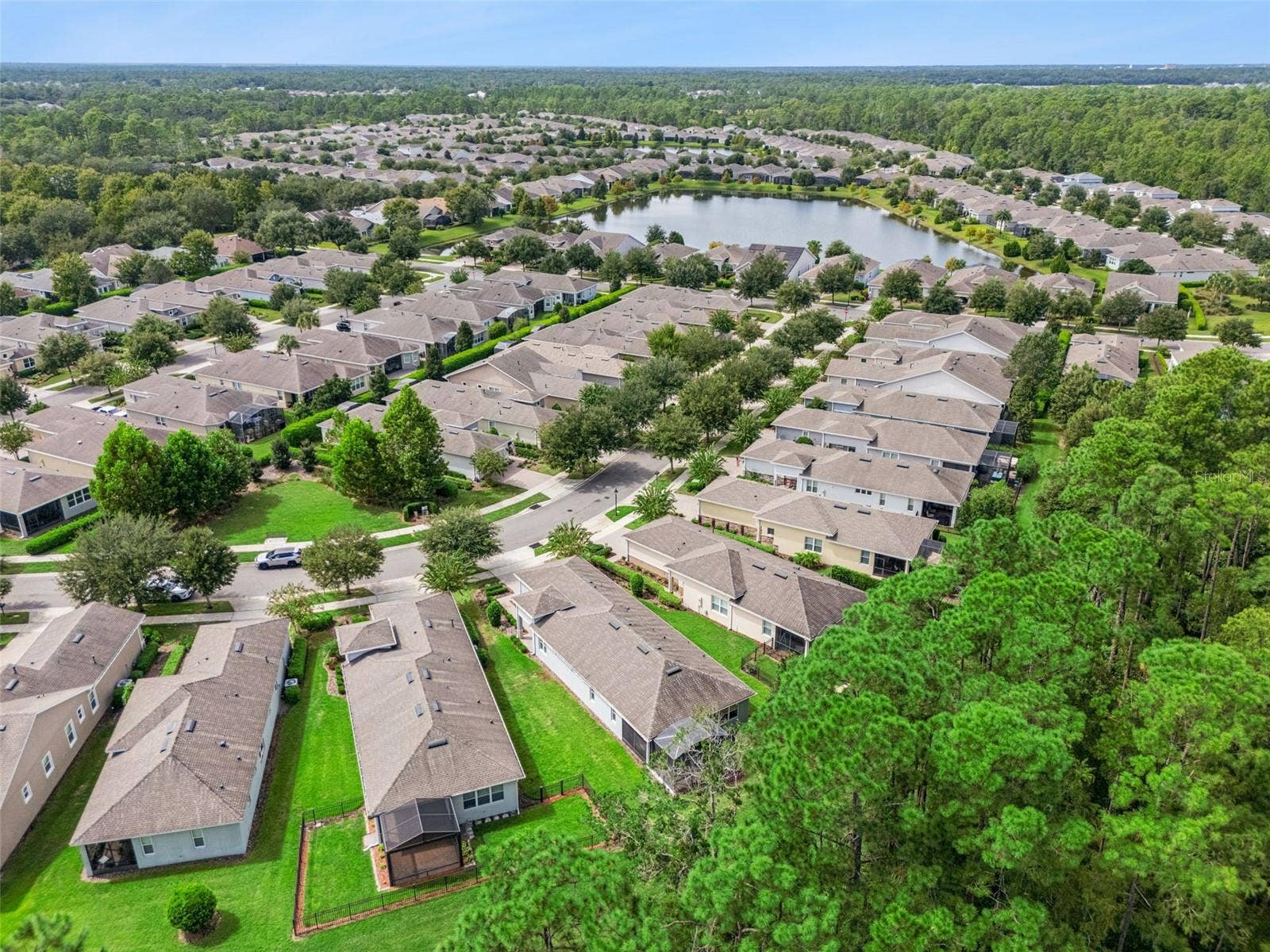 1305 HAYTON AVE., Deland, FL 32724 Aerial view from behind the Home overlooking a conservation area