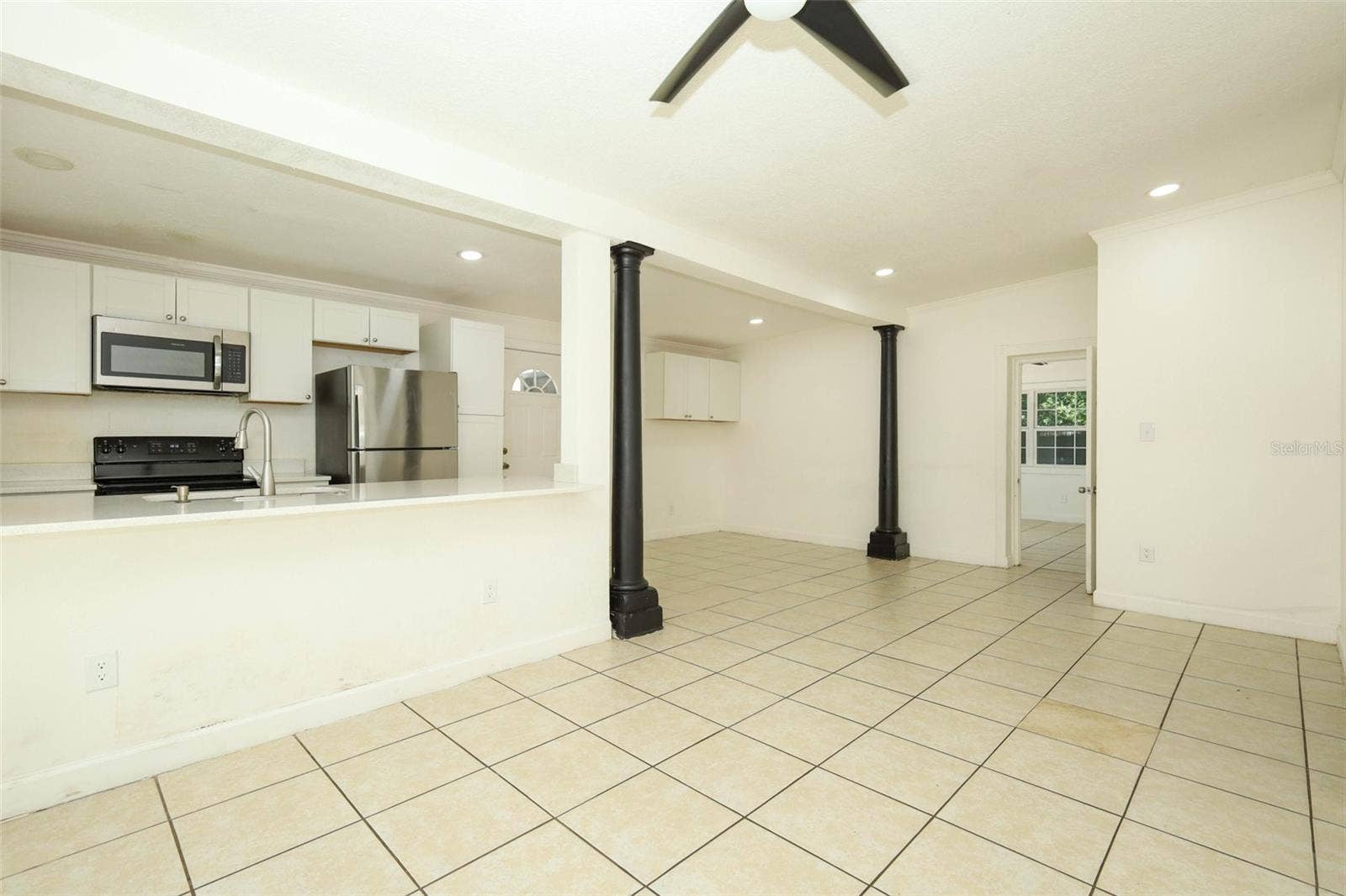 7614 BELL BOULEVARD, Orlando, FL 32810 living room