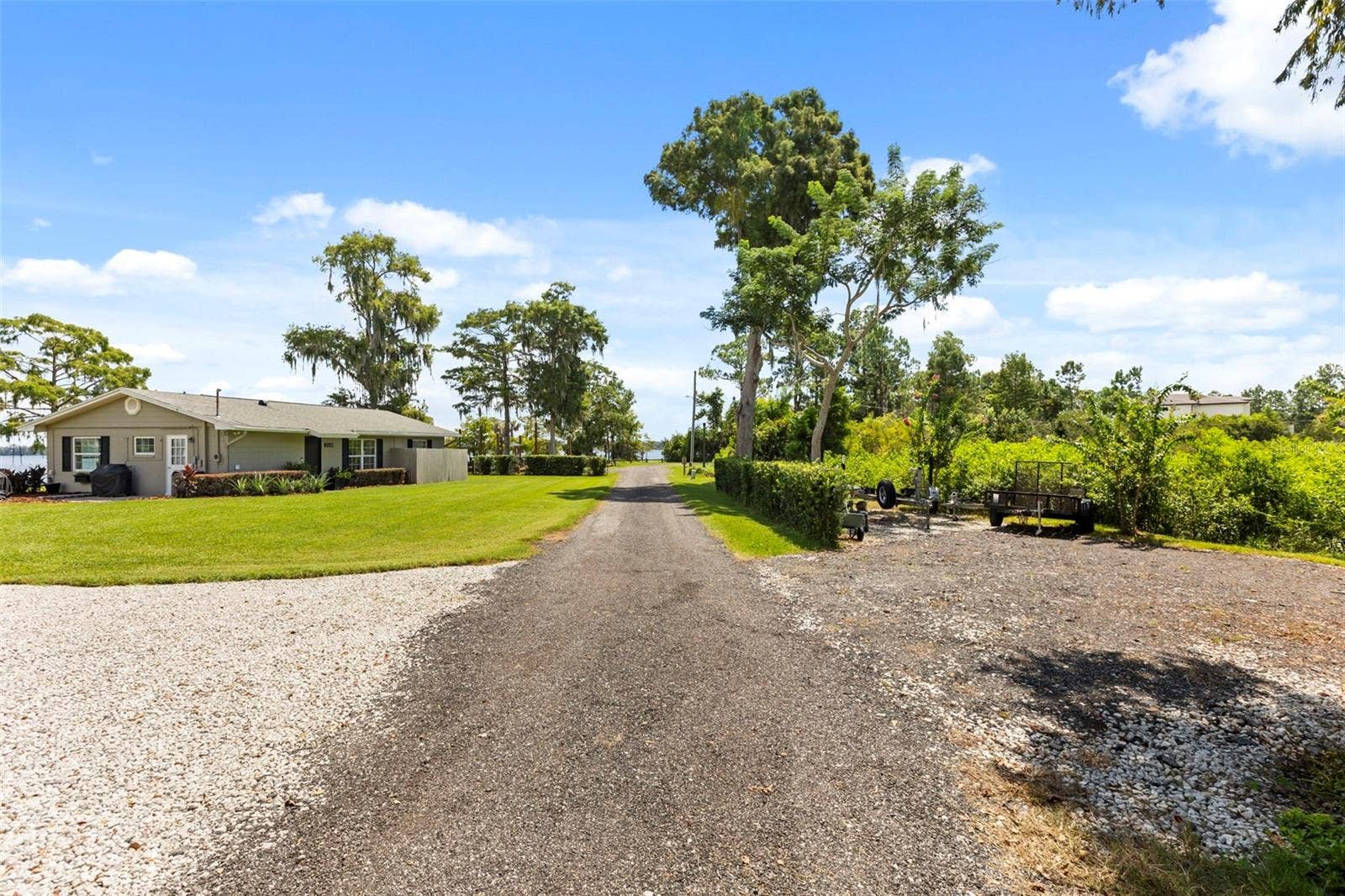 10430 LAKE COTTAGE LANE, Orlando, FL 32836 Rare Lake Sheen lakefront estate opportunity on the Butler Chain of Lakes! An exceptional opportunity to build a custom luxury lakefront residence on one of the most compelling properties along Lake Cottage Lane.