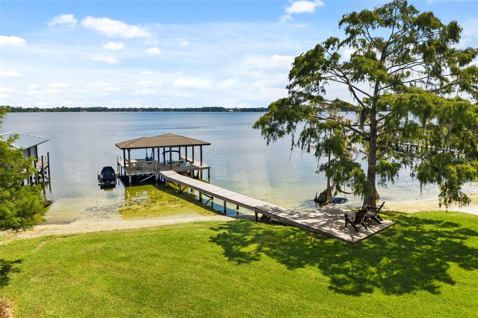 10430 LAKE COTTAGE LANE, Orlando, FL 32836 Rare Lake Sheen lakefront estate opportunity on the Butler Chain of Lakes! An exceptional opportunity to build a custom luxury lakefront residence on one of the most compelling properties along Lake Cottage Lane.
