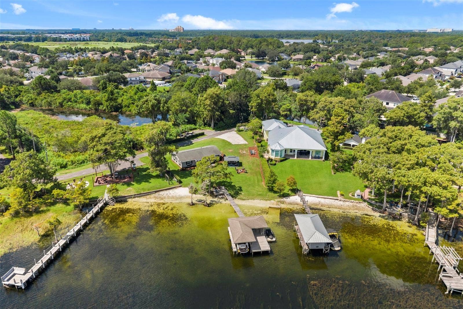 10430 LAKE COTTAGE LANE, Orlando, FL 32836 Rare Lake Sheen lakefront estate opportunity on the Butler Chain of Lakes! An exceptional opportunity to build a custom luxury lakefront residence on one of the most compelling properties along Lake Cottage Lane.