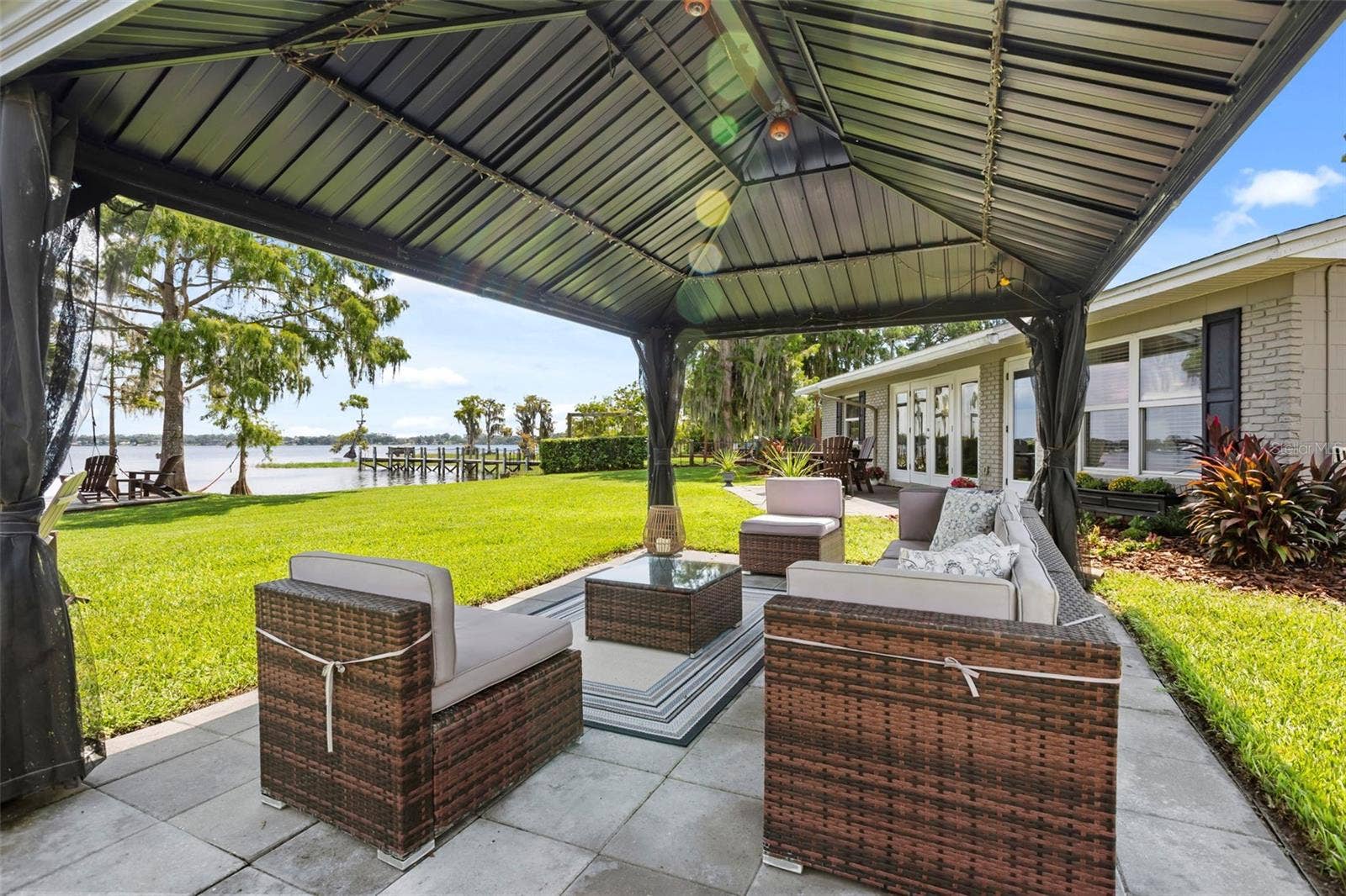 10430 LAKE COTTAGE LANE, Orlando, FL 32836 Rare Lake Sheen lakefront estate opportunity on the Butler Chain of Lakes! An exceptional opportunity to build a custom luxury lakefront residence on one of the most compelling properties along Lake Cottage Lane.