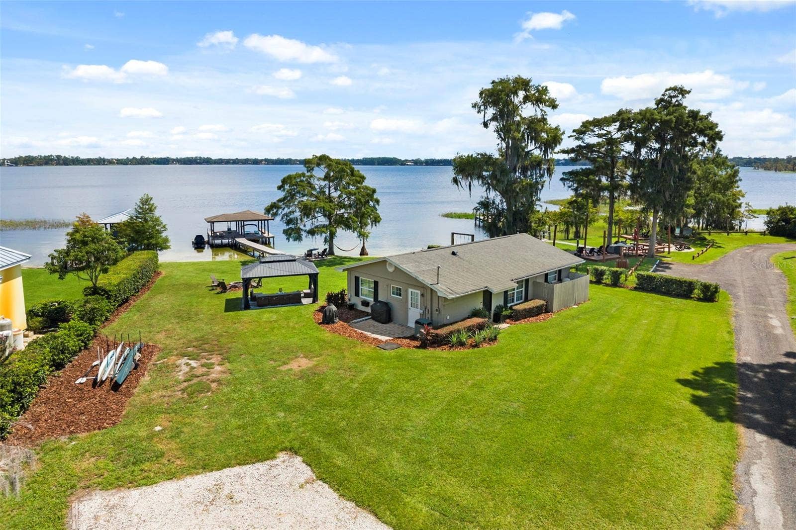 10430 LAKE COTTAGE LANE, Orlando, FL 32836 Rare Lake Sheen lakefront estate opportunity on the Butler Chain of Lakes! An exceptional opportunity to build a custom luxury lakefront residence on one of the most compelling properties along Lake Cottage Lane.