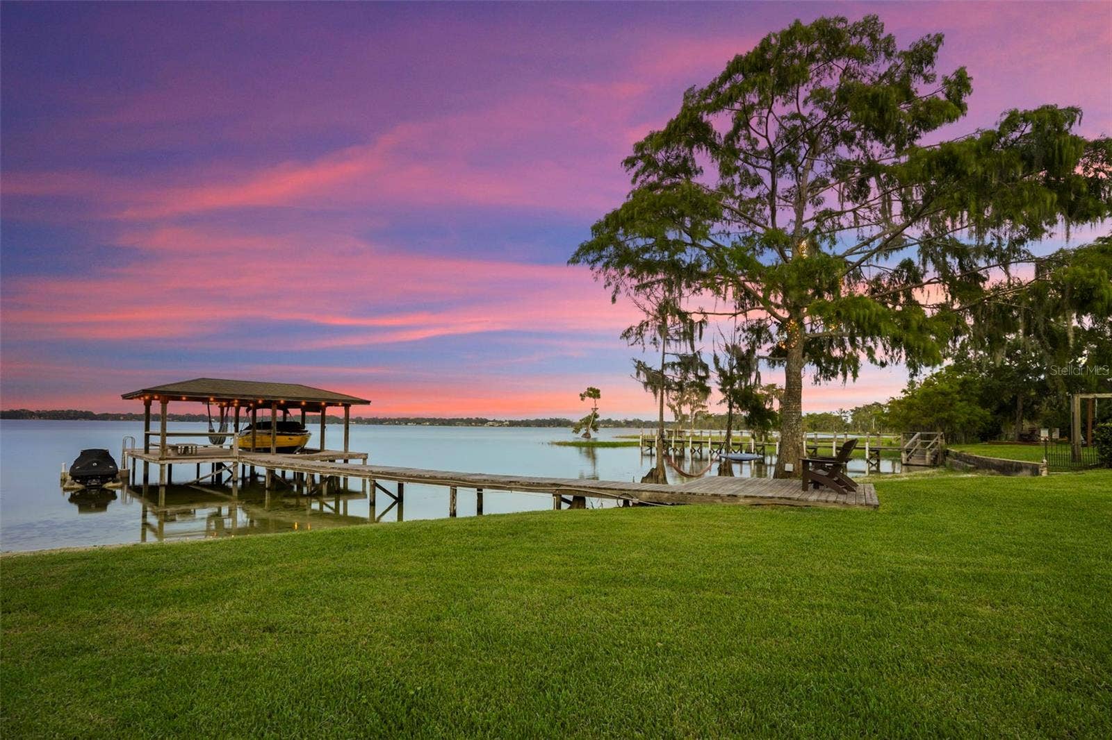 10430 LAKE COTTAGE LANE, Orlando, FL 32836 Rare Lake Sheen lakefront estate opportunity on the Butler Chain of Lakes! An exceptional opportunity to build a custom luxury lakefront residence on one of the most compelling properties along Lake Cottage Lane.
