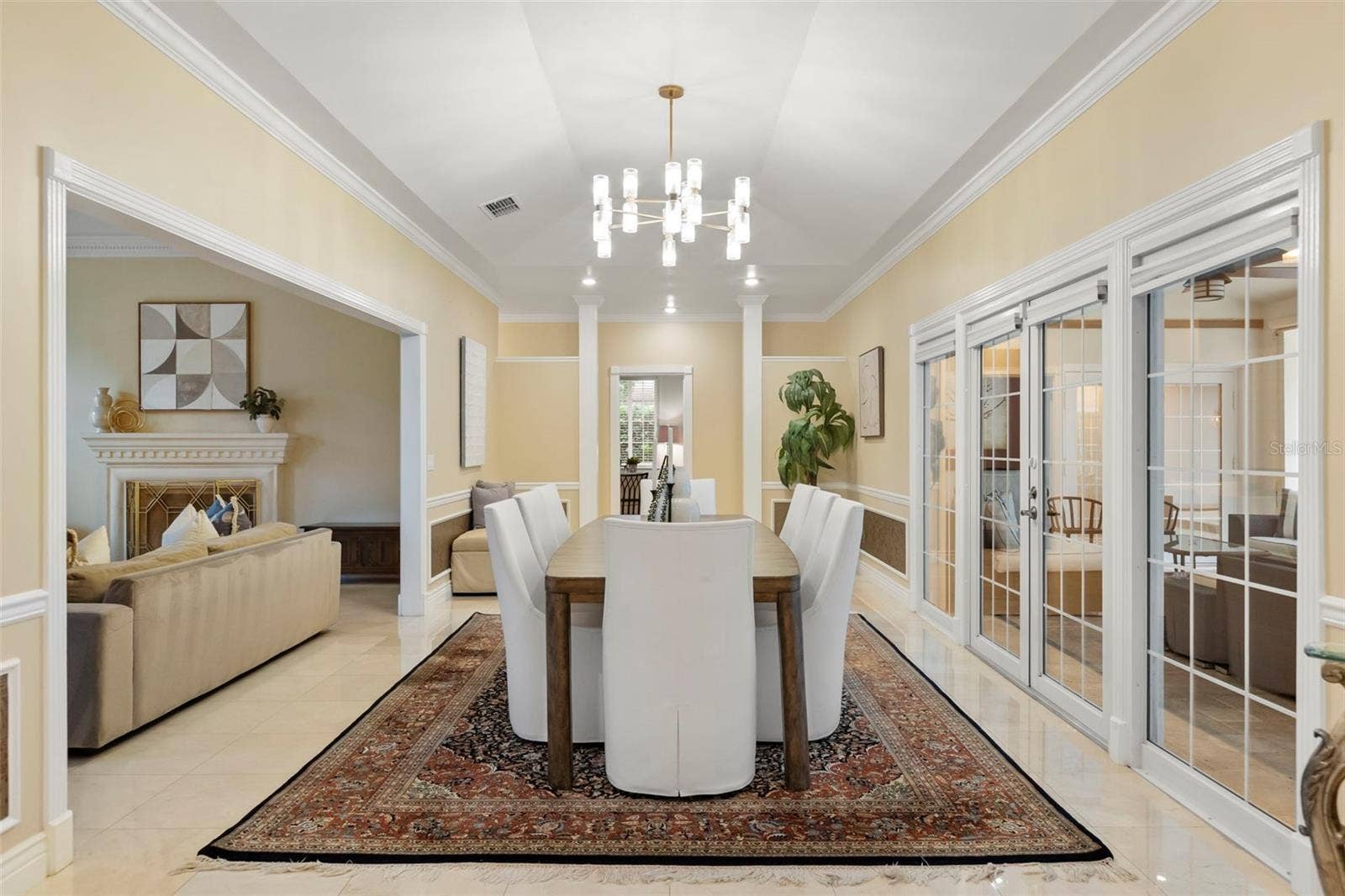 Formal Dining Room with French Doors leading to Courtyard