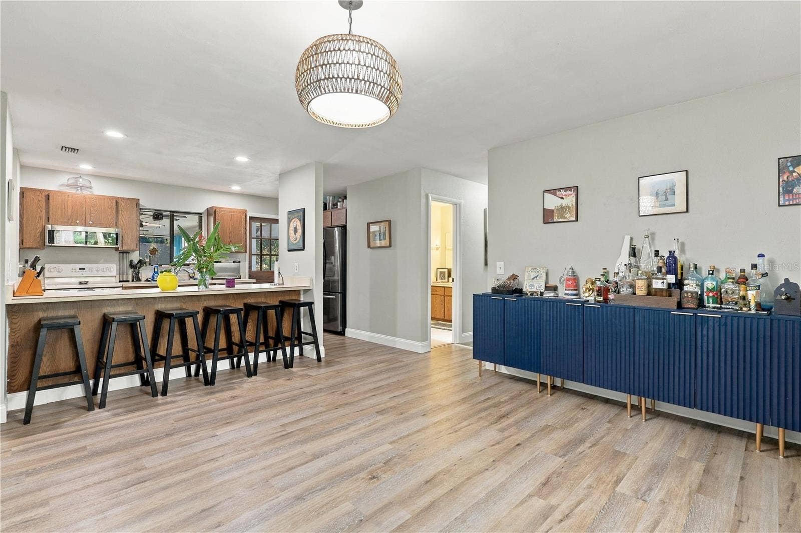 Second Living Area or Large Formal Dining Room, Breakfast Bar Overlooking the Kitchen.
