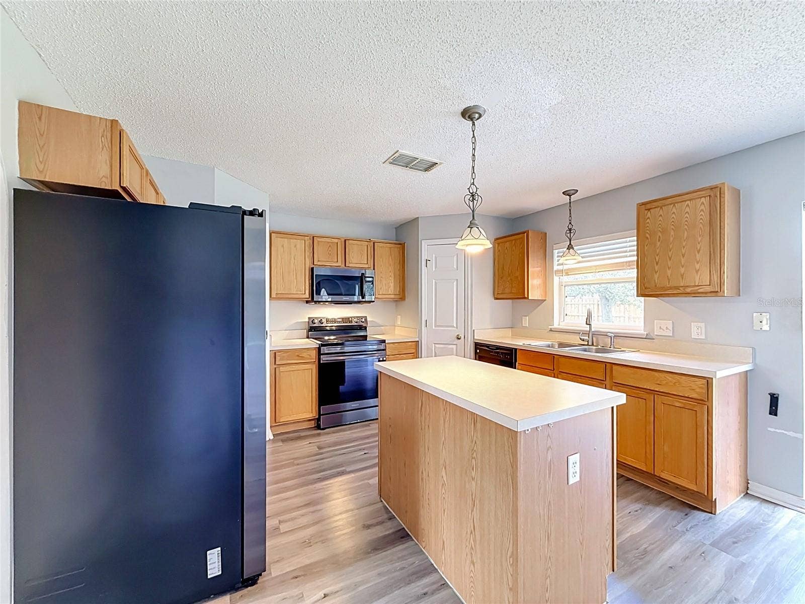 2032 ELMHURST LANE, Mascotte, FL 34753