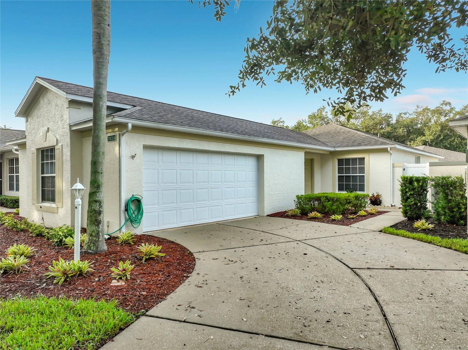 Two car garage with extra spot for Golf cart